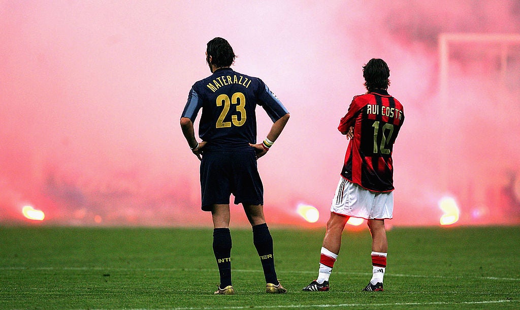 Marco Materazzi and Rui Costa look on during the 2005 Champions League quarter-final