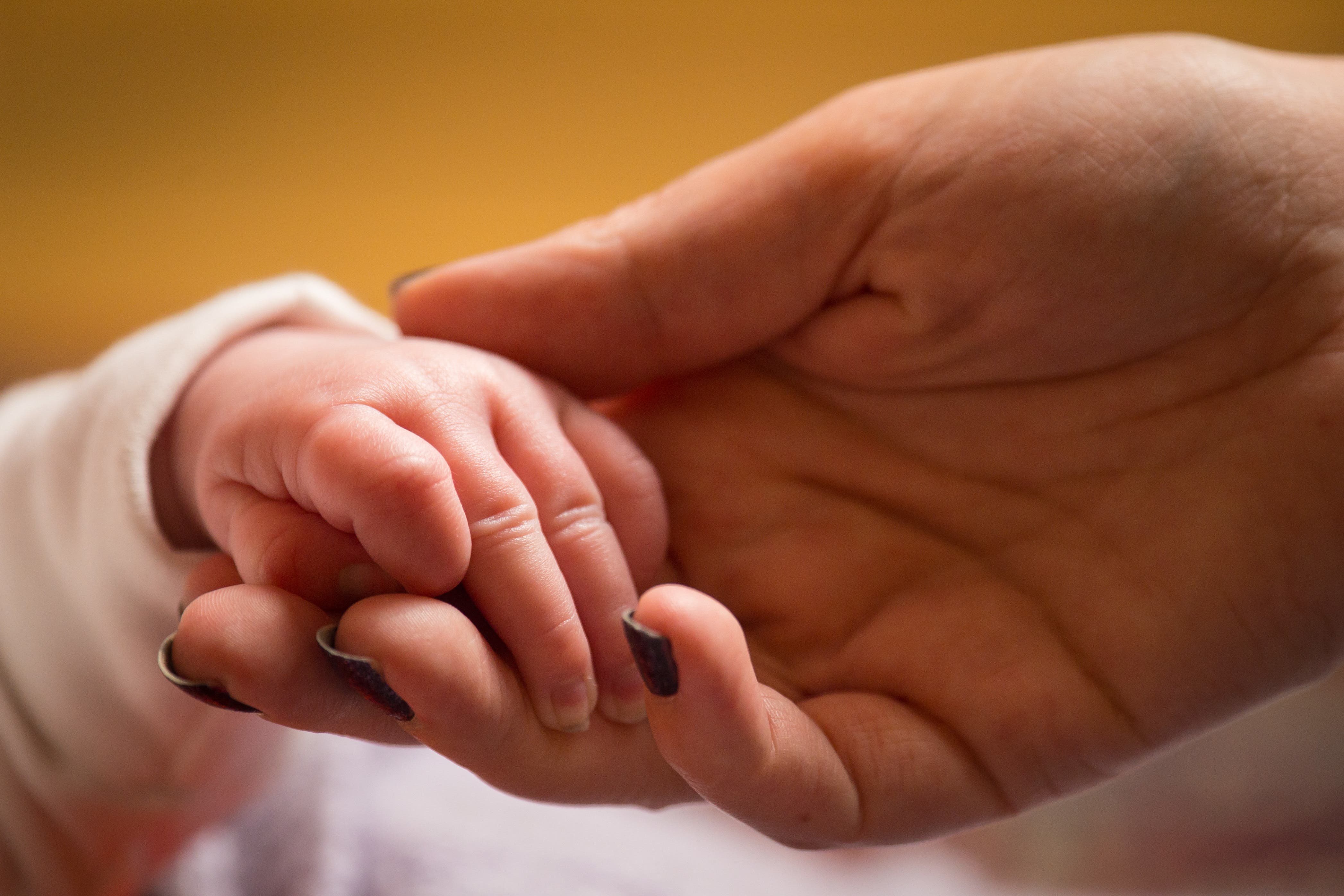 A baby has been born in the UK using DNA from three parents (Dominic Lipinski/PA)