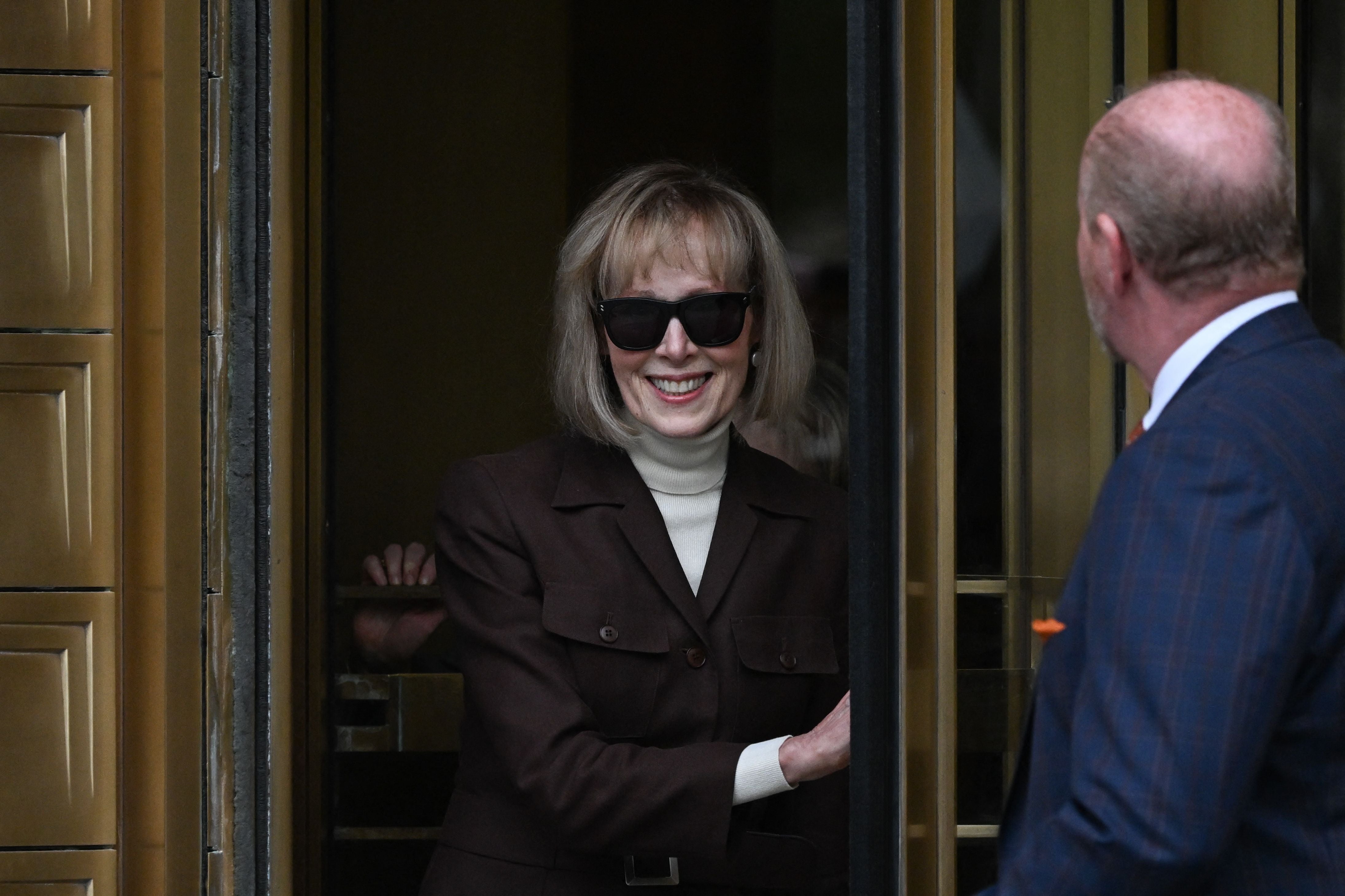 US magazine columnist E. Jean Carroll departs the Manhattan Federal Court in New York City