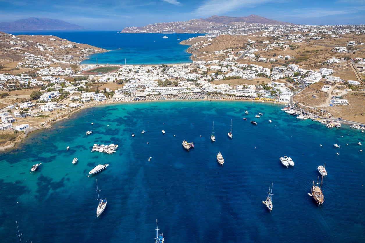 Aerial view of the popular Ornos beach on the island of Mykonos, Cyclades, Greece