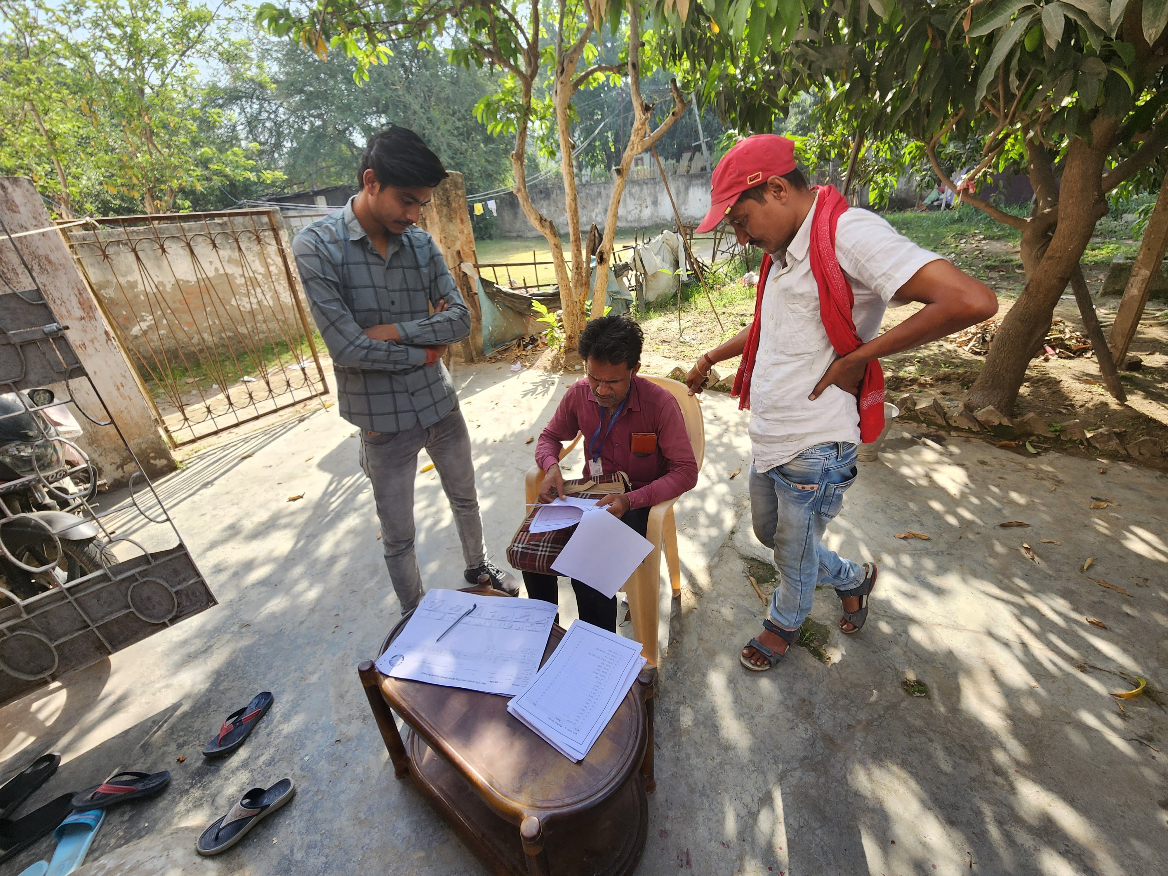 Alok Kumar (left), census taker Satyadeo Paswa and Kiran Chaudhary try to decipher the codes in the Bihar caste survey