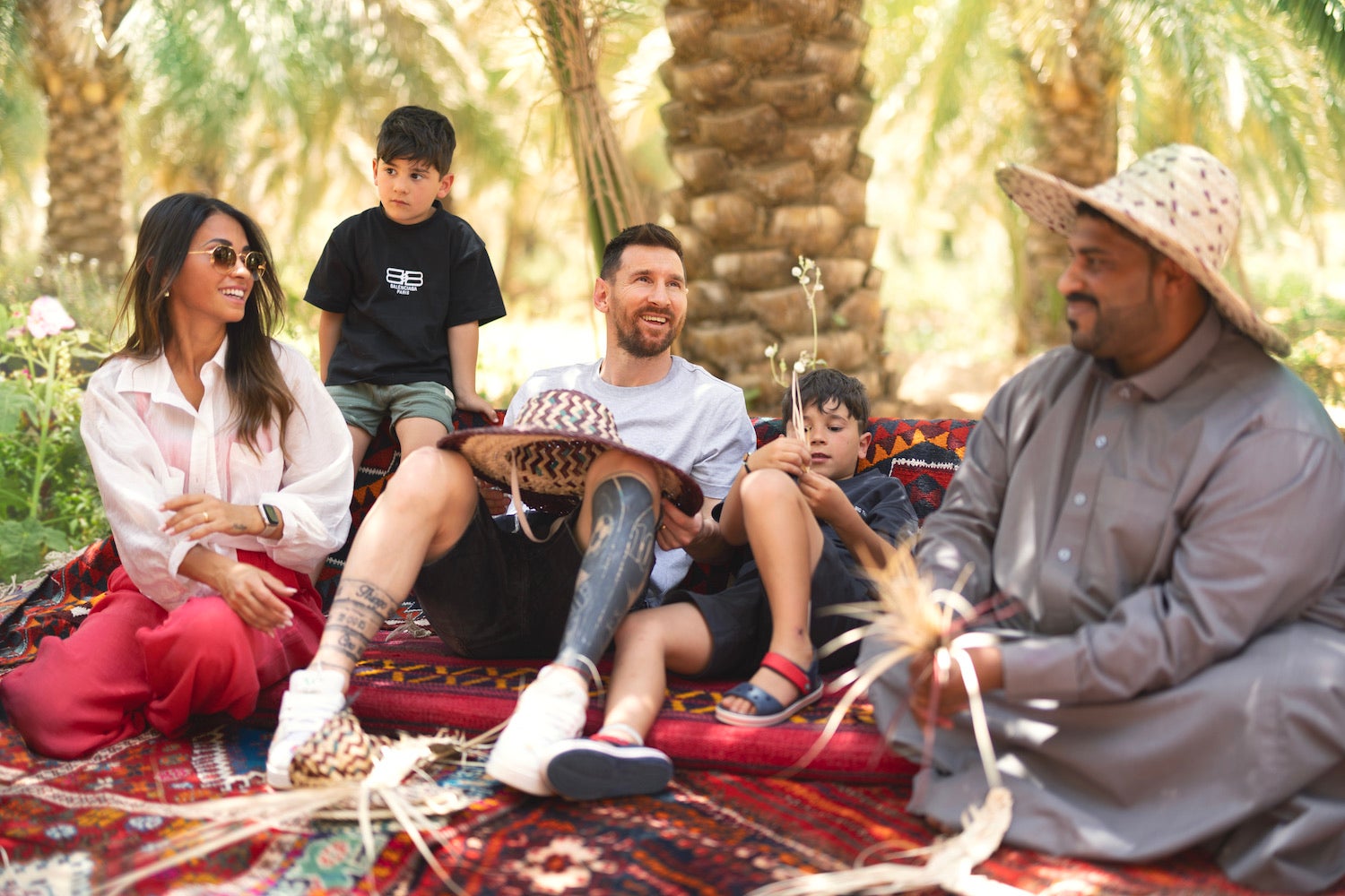 The family are given some insider tips on the art of palm weaving