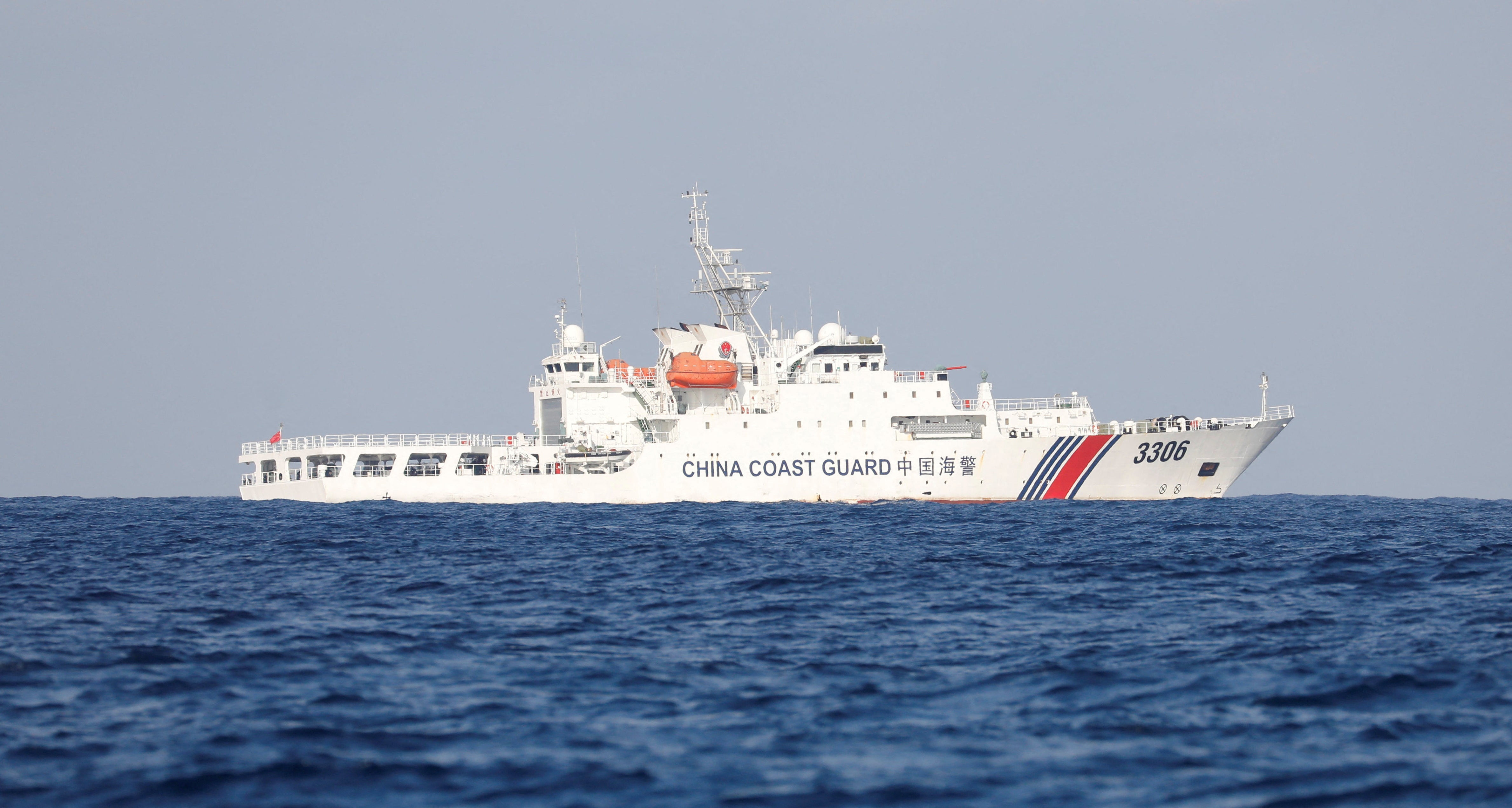 FILE PHOTO: A China Coast Guard vessel patrols at the disputed Scarborough Shoal April 5, 2017. Picture taken April 5, 2017