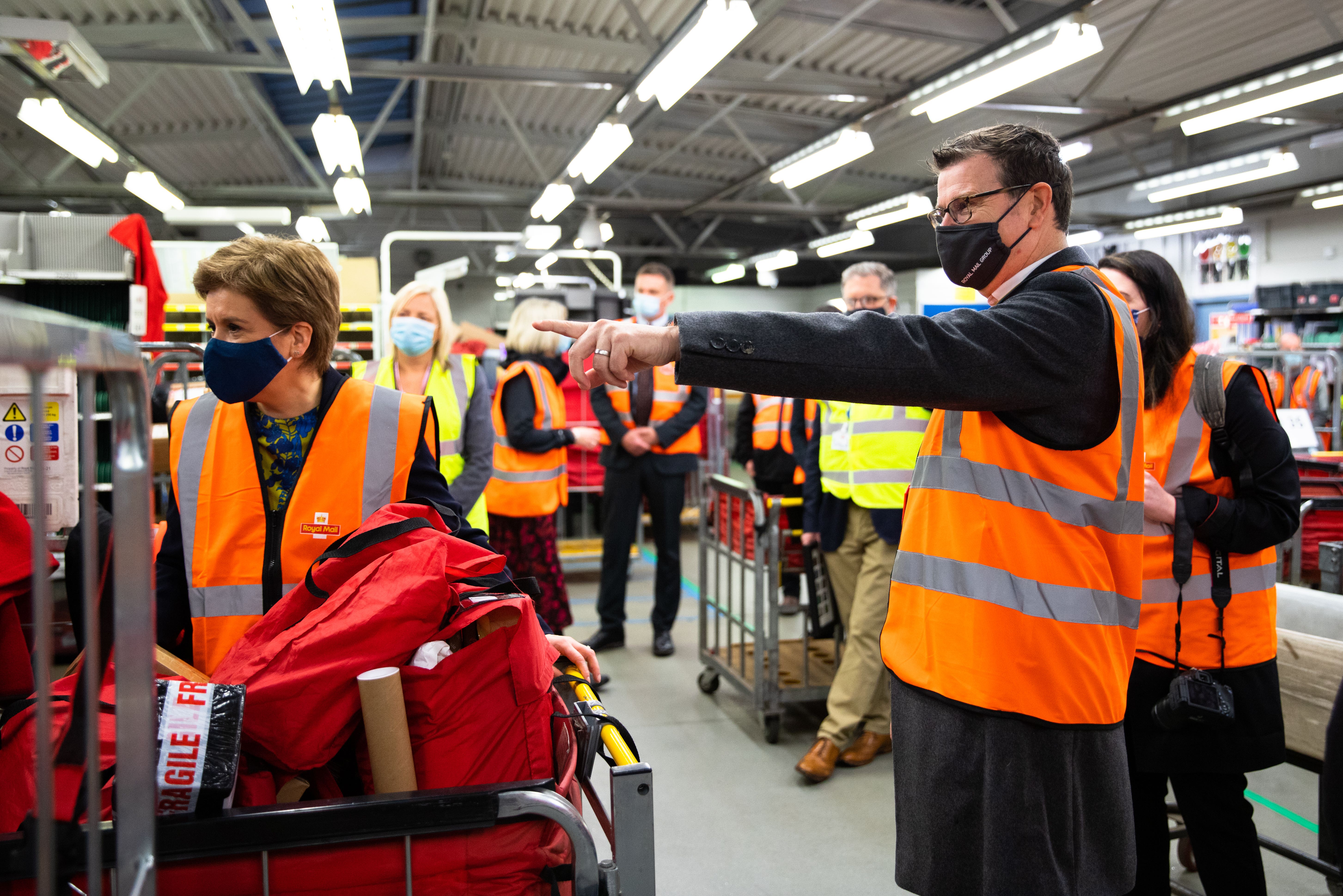 Simon Thompson (right) plans to step down from the role of CEO in October (Royal Mail/PA)