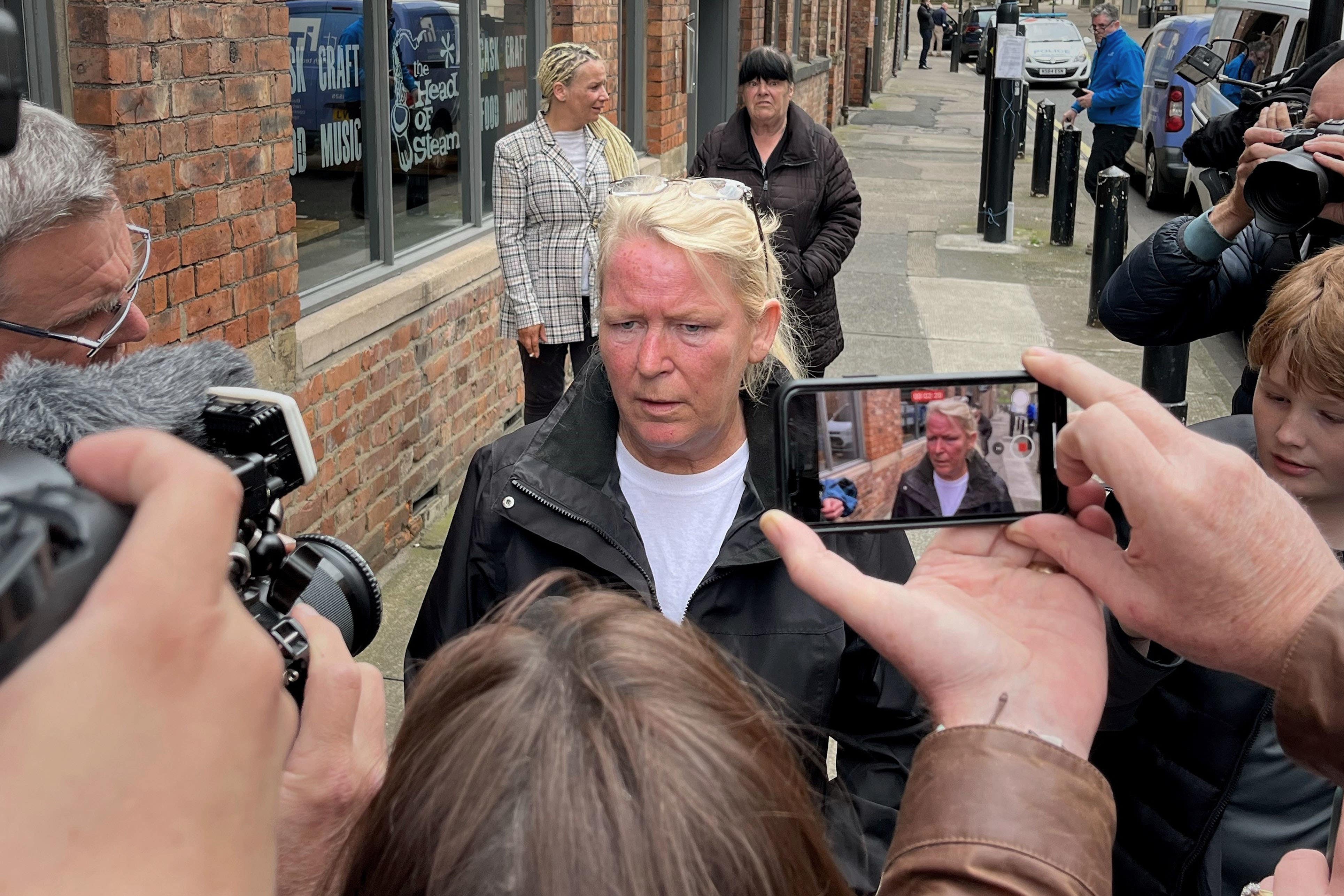 Sharon Henderson talks to the media outside Newcastle Crown Court (Tom Wilkinson/PA)