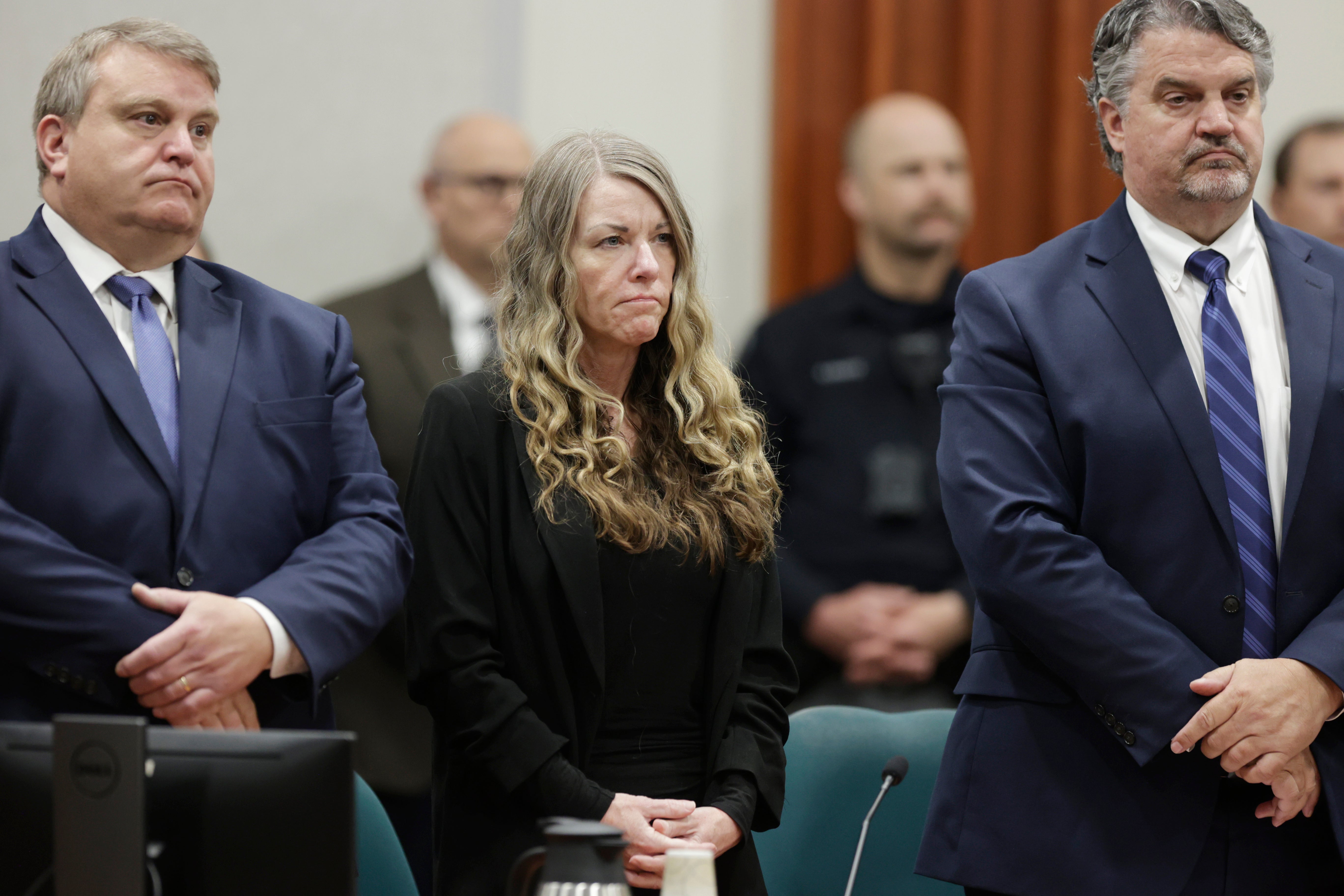 Lori Vallow Daybell stands and listens as the jury's verdict is read