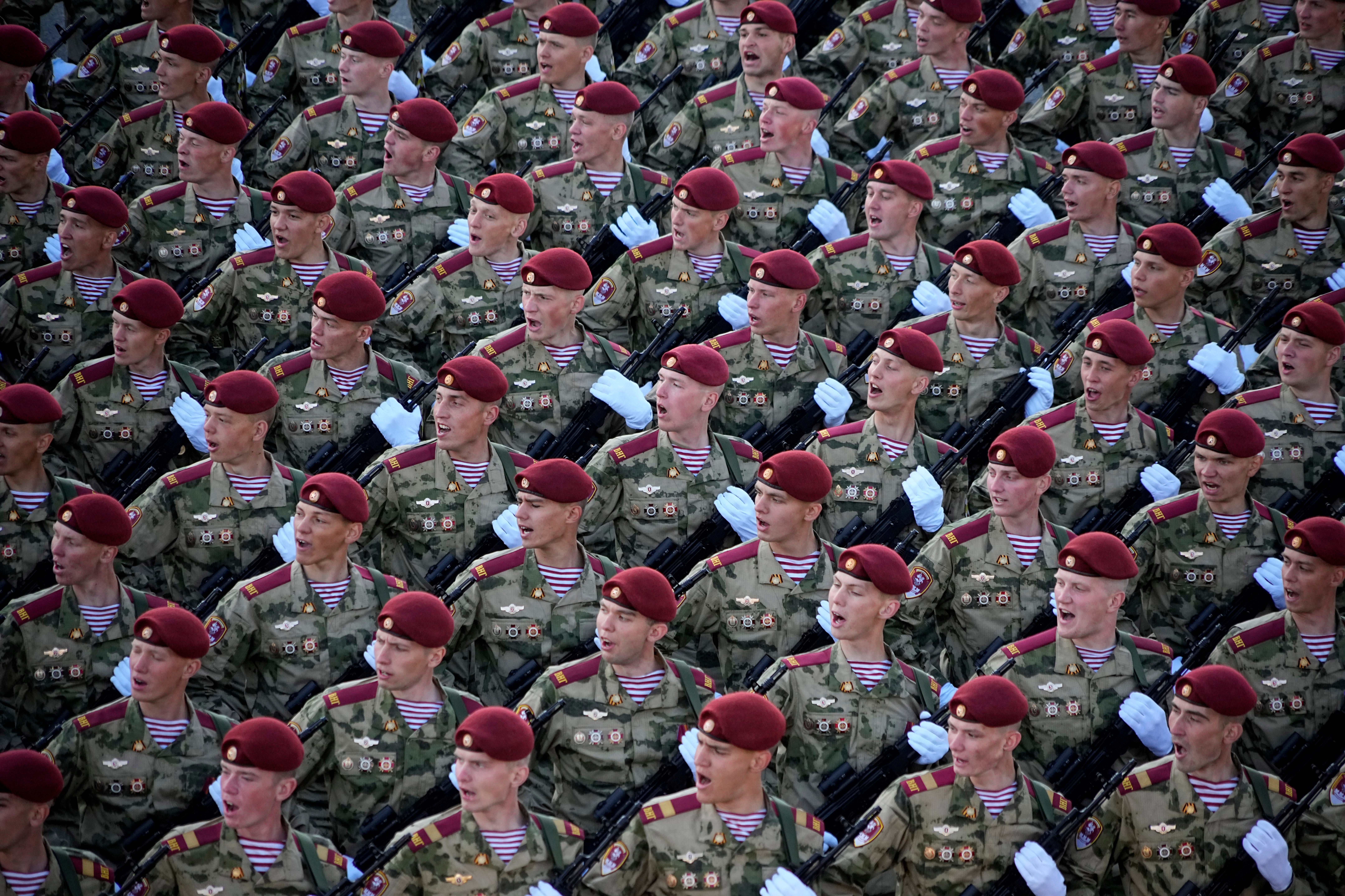 Russian soldiers march towards Red Square as part of a Victory Day military parade in Moscow on 9 May 2023