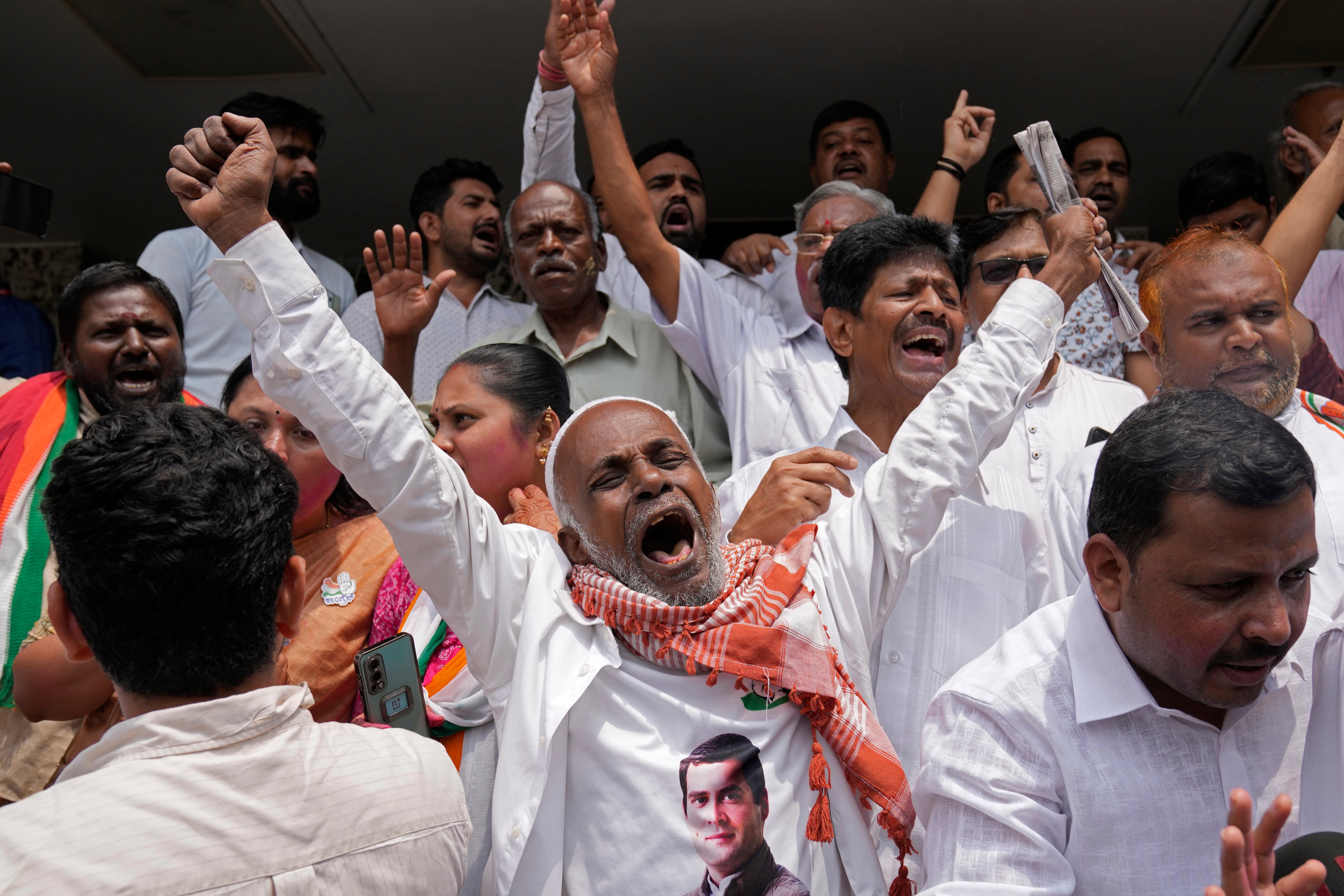 A supporter of opposition Congress party celebrates