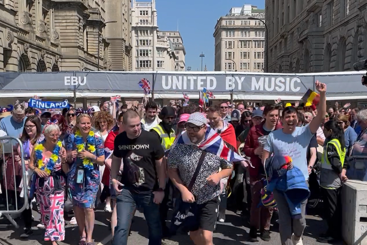 The gates of the Eurovision Village at Pier Head in Liverpool are opened (Alex Green/PA)