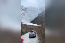 Moment hikers flee in terror as avalanche hurtles towards them