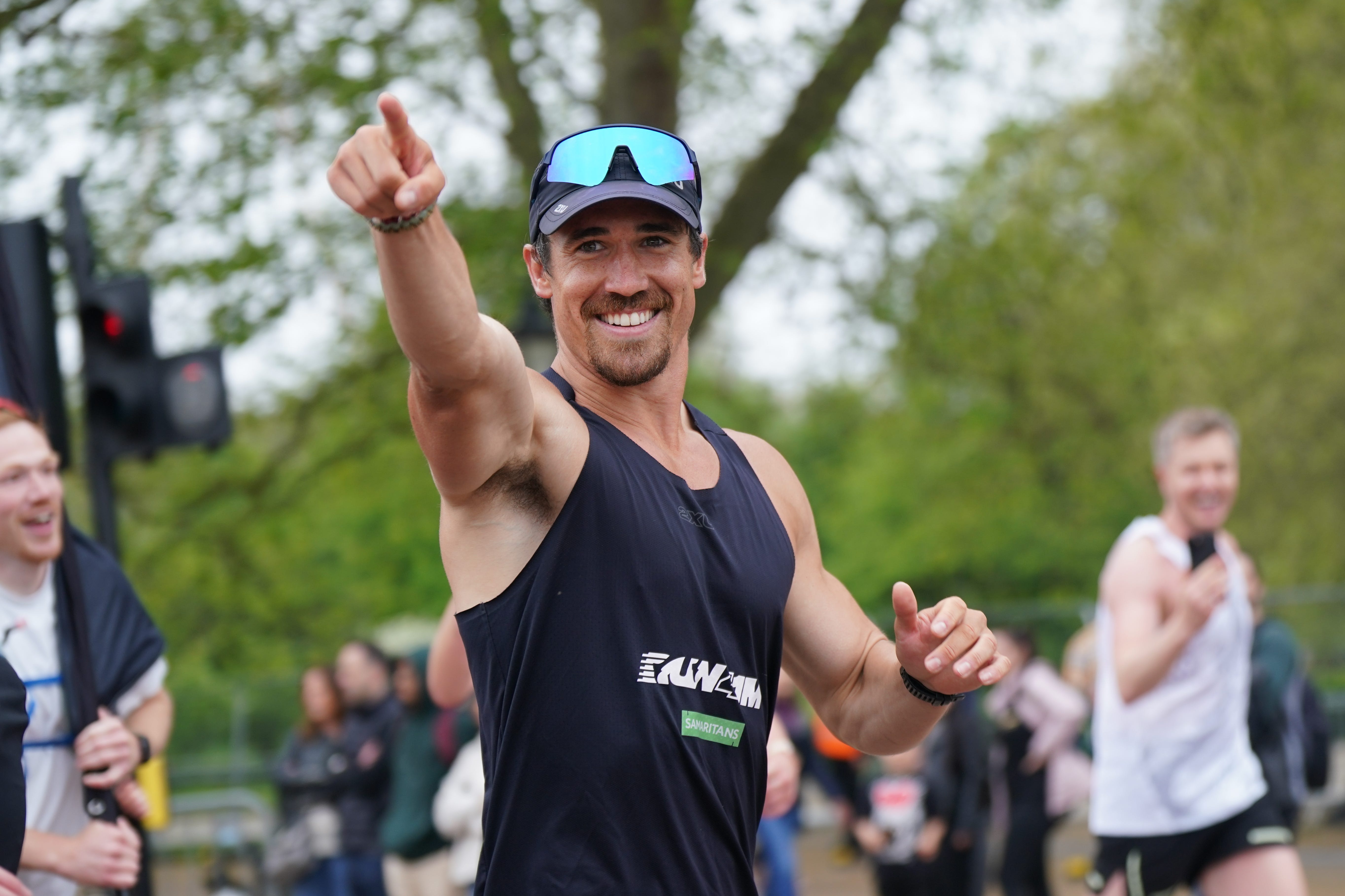 Josh Patterson outside the gates of Buckingham Palace after completing 76 marathons in consecutive days (Yui Mok/PA Wire)