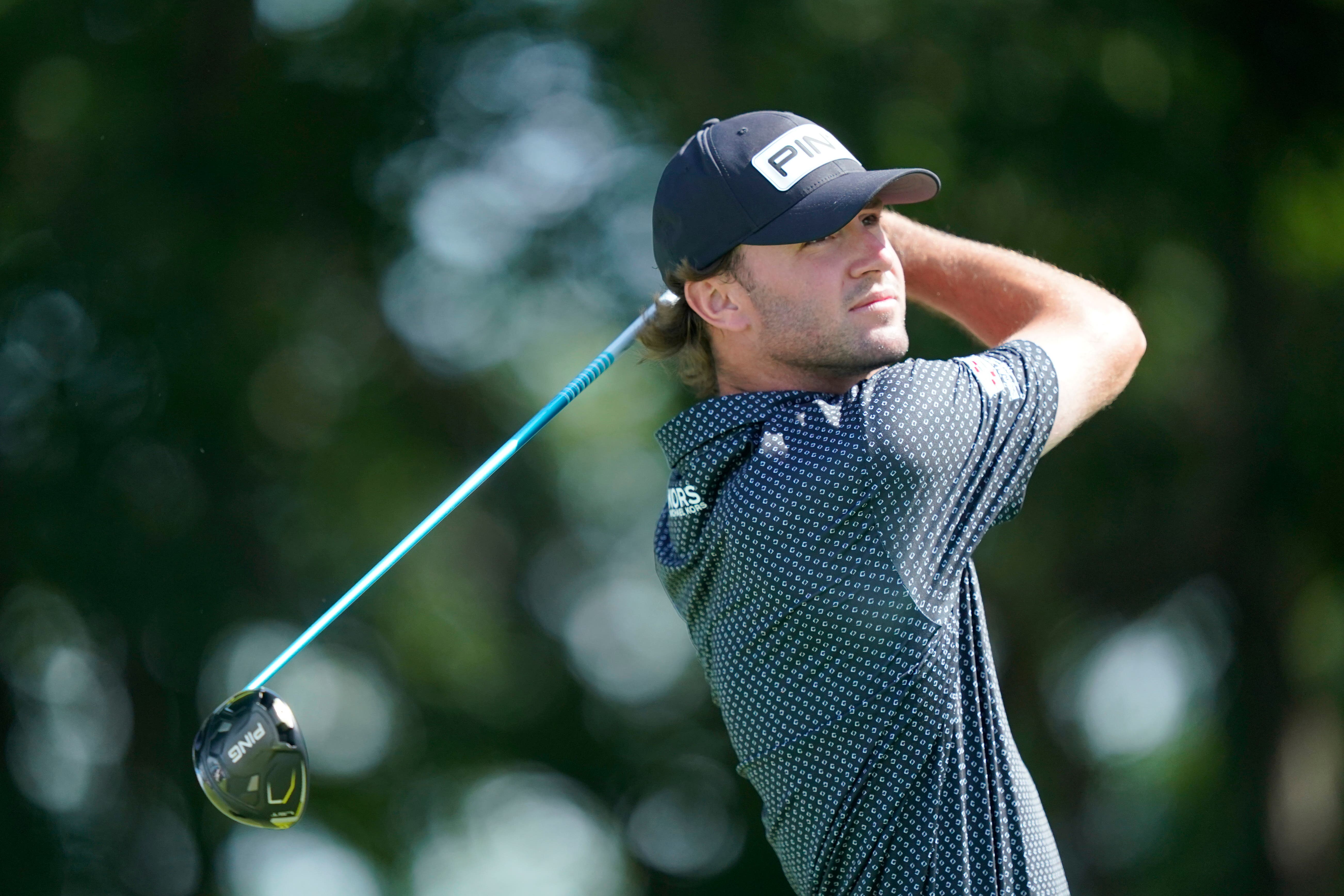 Austin Eckroat hits a tee shot on the second hole (LM Otero/AP)