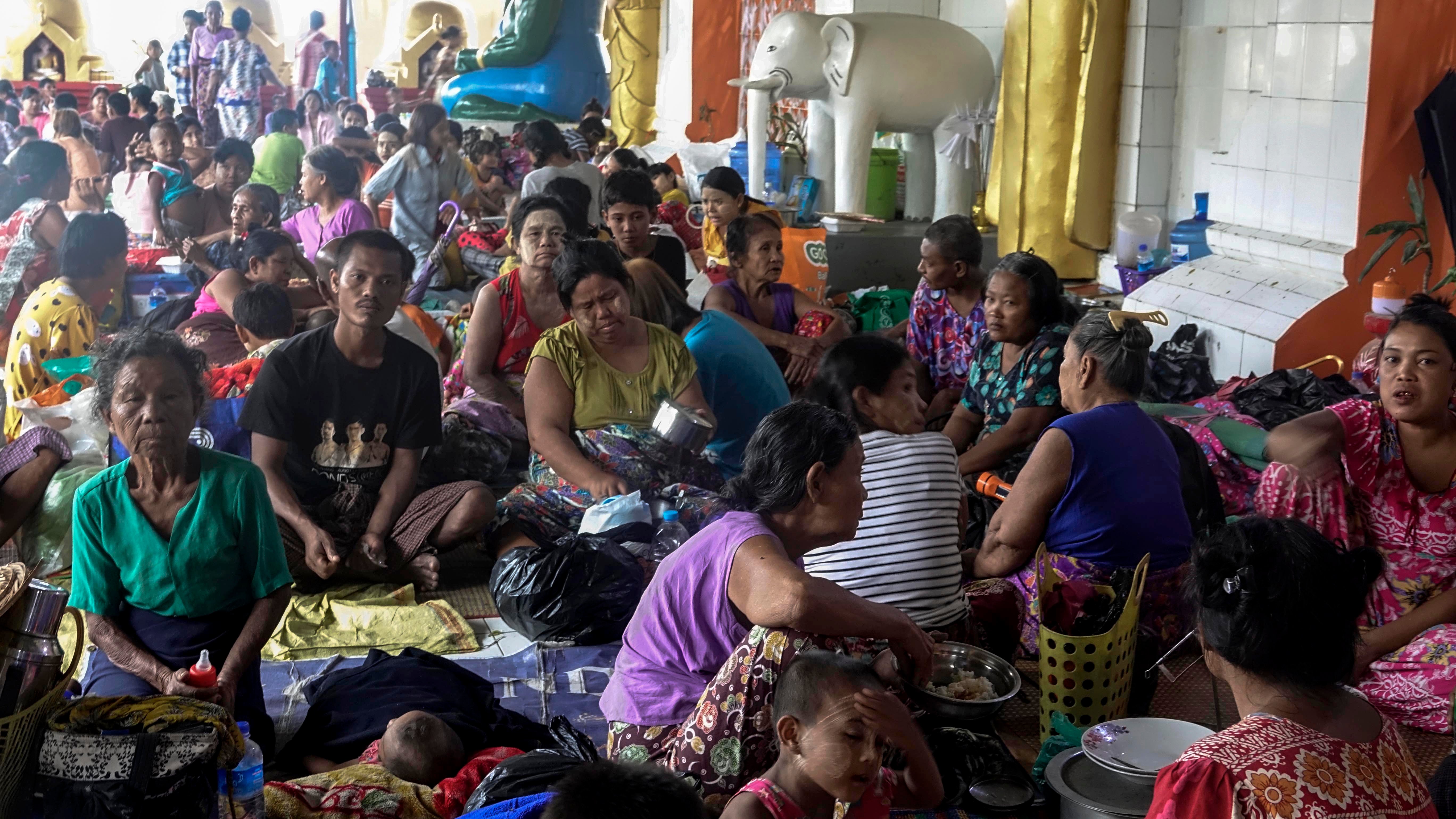 People gather at a monastery used as a temporary shelter in Sittwe, Rakhine State