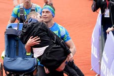 Rob Burrow carried over finish line by Kevin Sinfield in emotional moment at Leeds Marathon