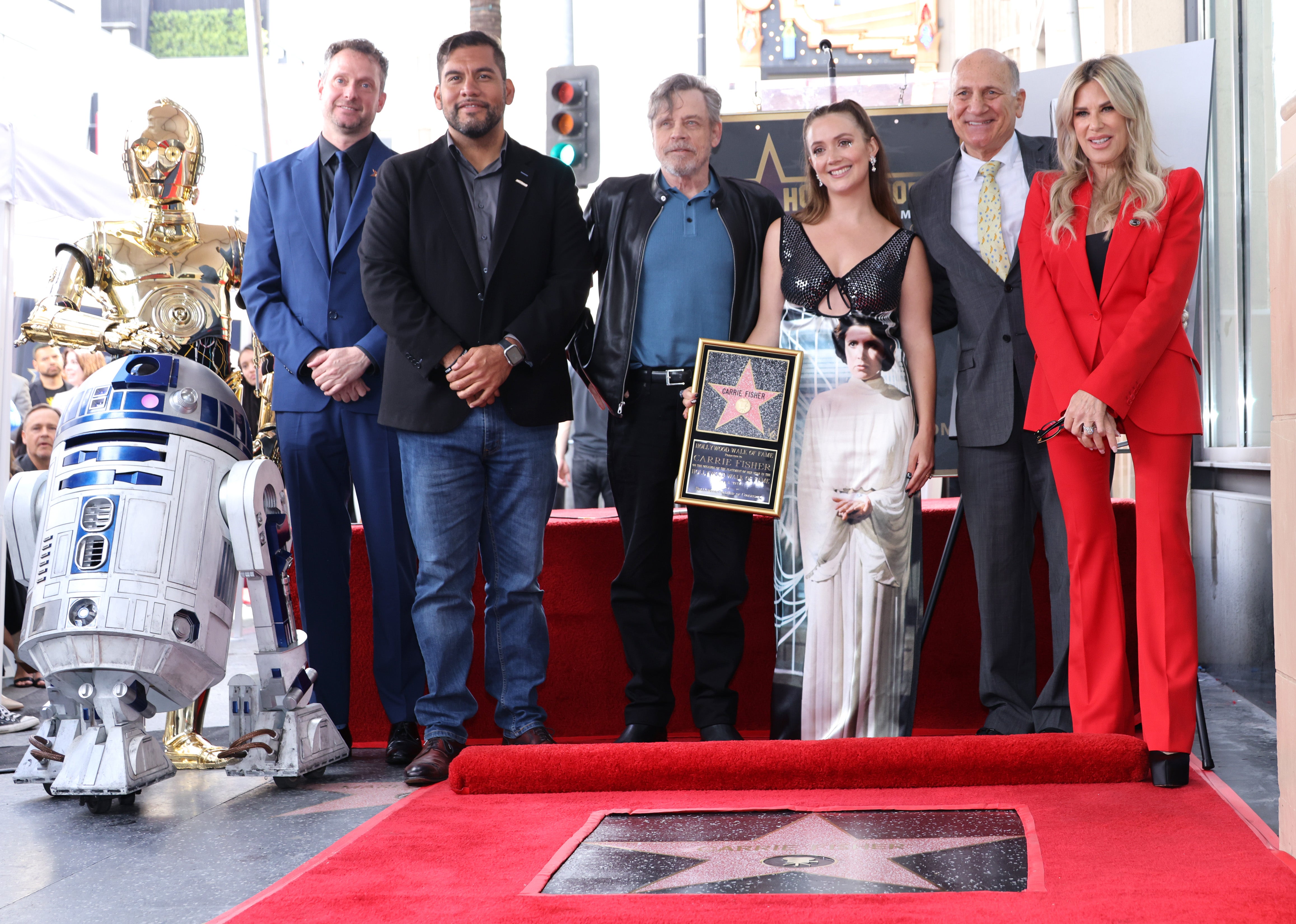 (L-R) Matt Fritch, Hugo Soto-Martinez, Mark Hamill, Billie Lourd, Steve Nissen and Ellen K attend the ceremony for Carrie Fisher being honored posthumously with a Star on the Hollywood Walk of Fame on May 04, 2023