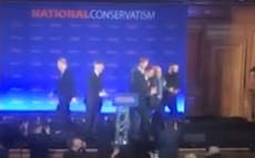 Politics UK – live: Protester storms stage during Jacob Rees-Mogg speech and warns of ‘fascism’