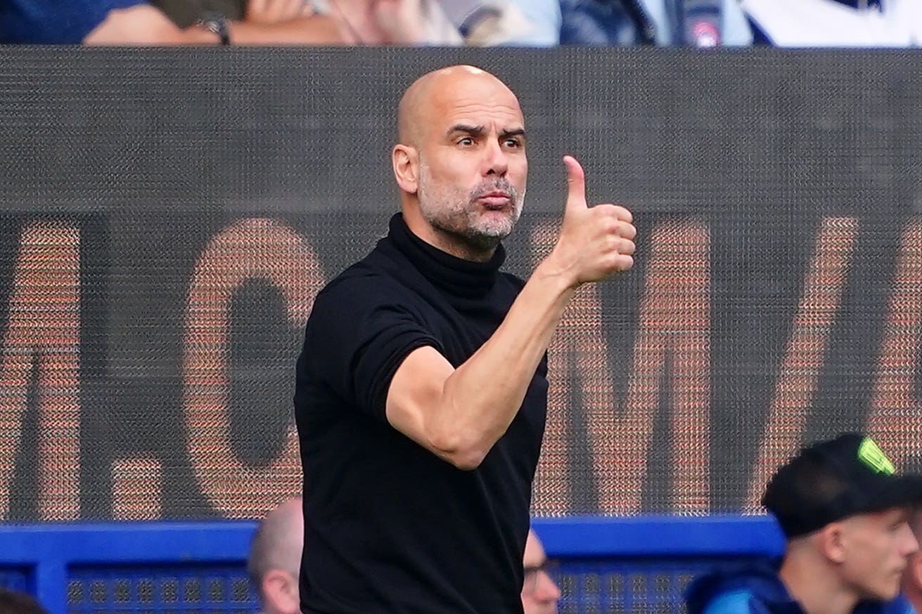 Manchester City manager Pep Guardiola is looking forward to a decisive week in their season (Peter Byrne/PA)
