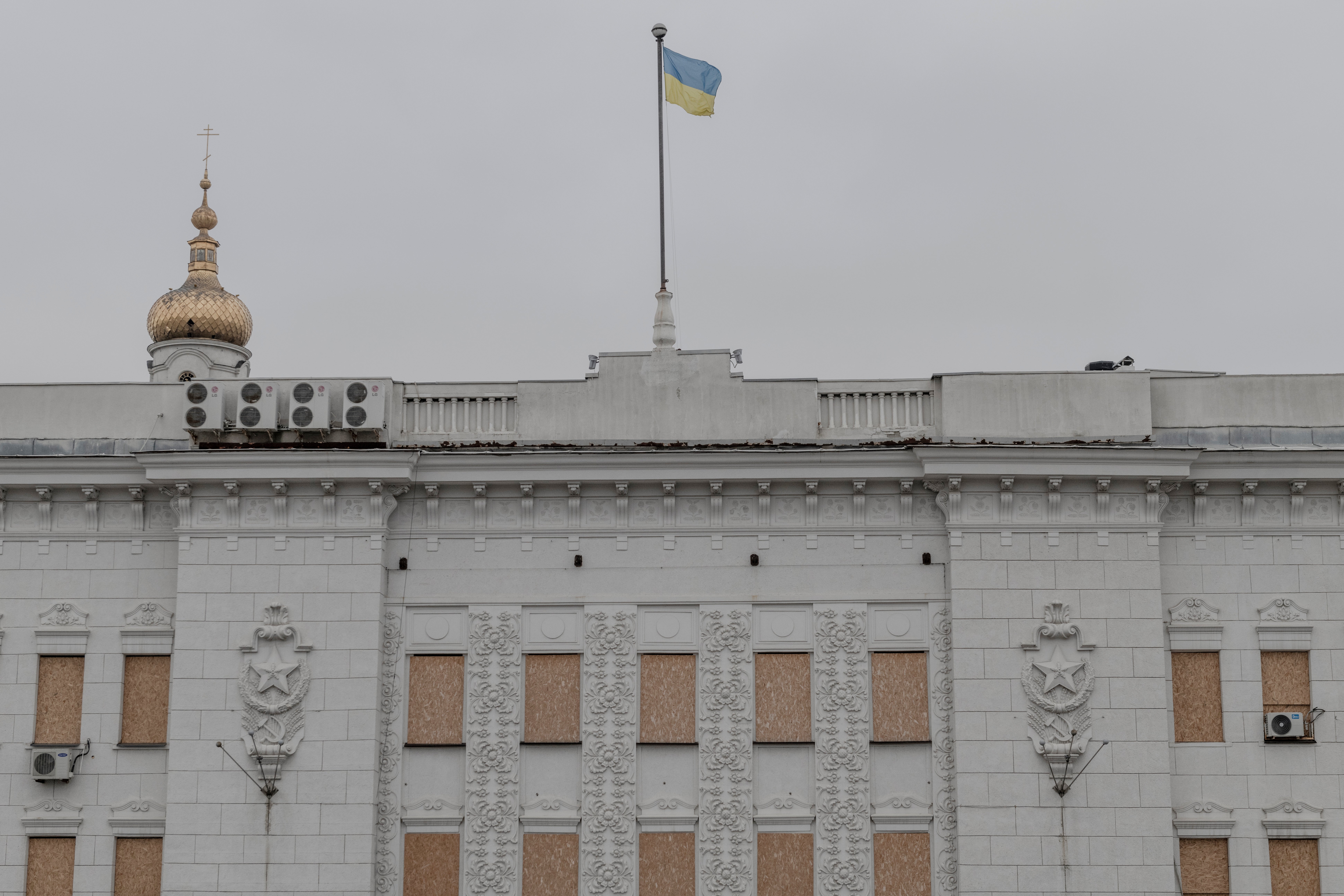 Kharkiv's city hall still bears the markings of its Soviet past: the hammer and sickle is part of its facade