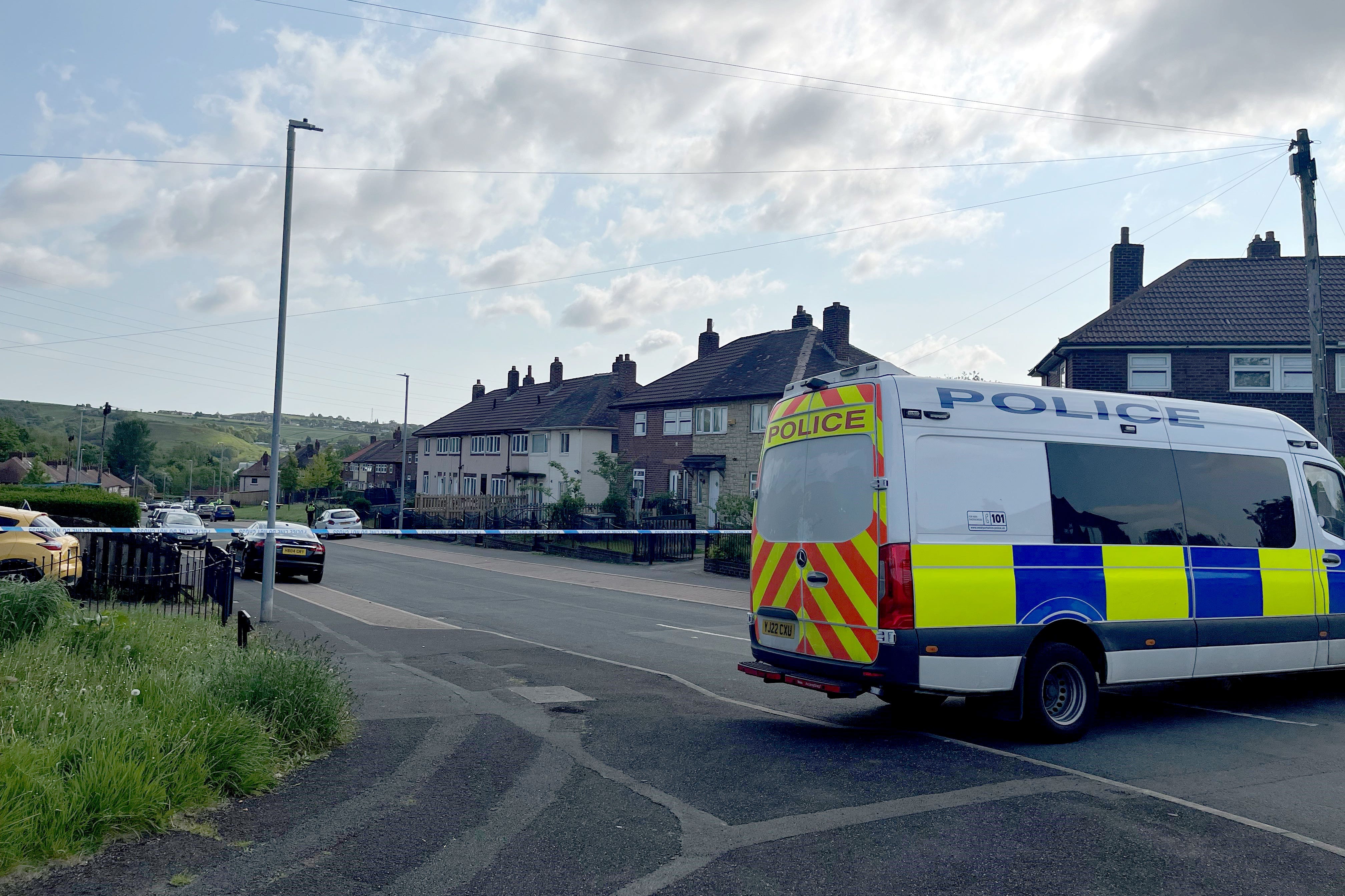 A police cordon on Harpe Inge, Huddersfield (Katie Dickenson/PA)