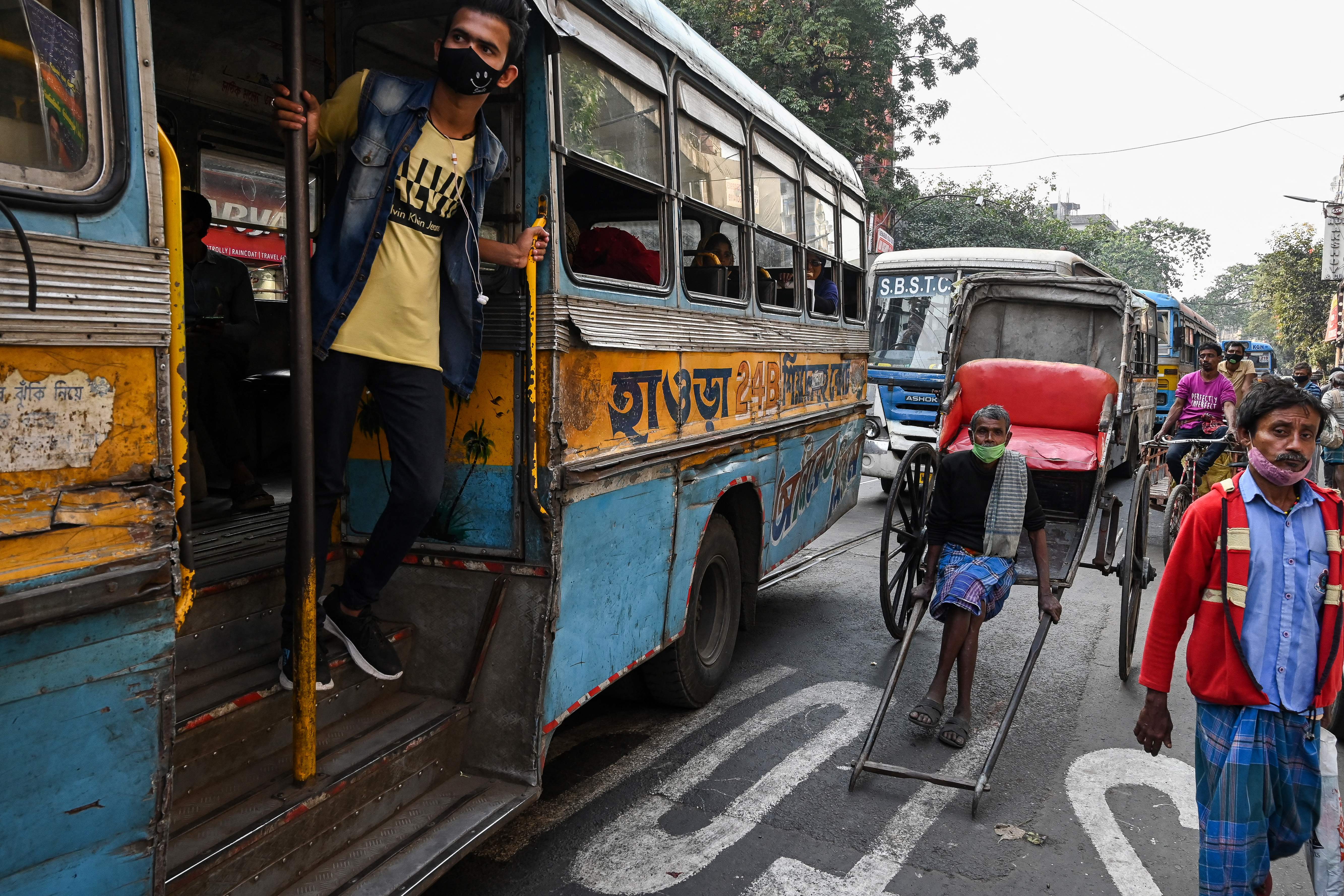 Representational image of a commuter peeping out of a bus stuck in traffic in Kolkata on 31 January 2022