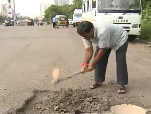 An Indian father had filled in almost 600 potholes across Mumbai in 2018