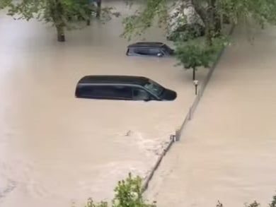 Images taken from the balcony of the hotel the Alpine team were staying in show the extent of the flooding