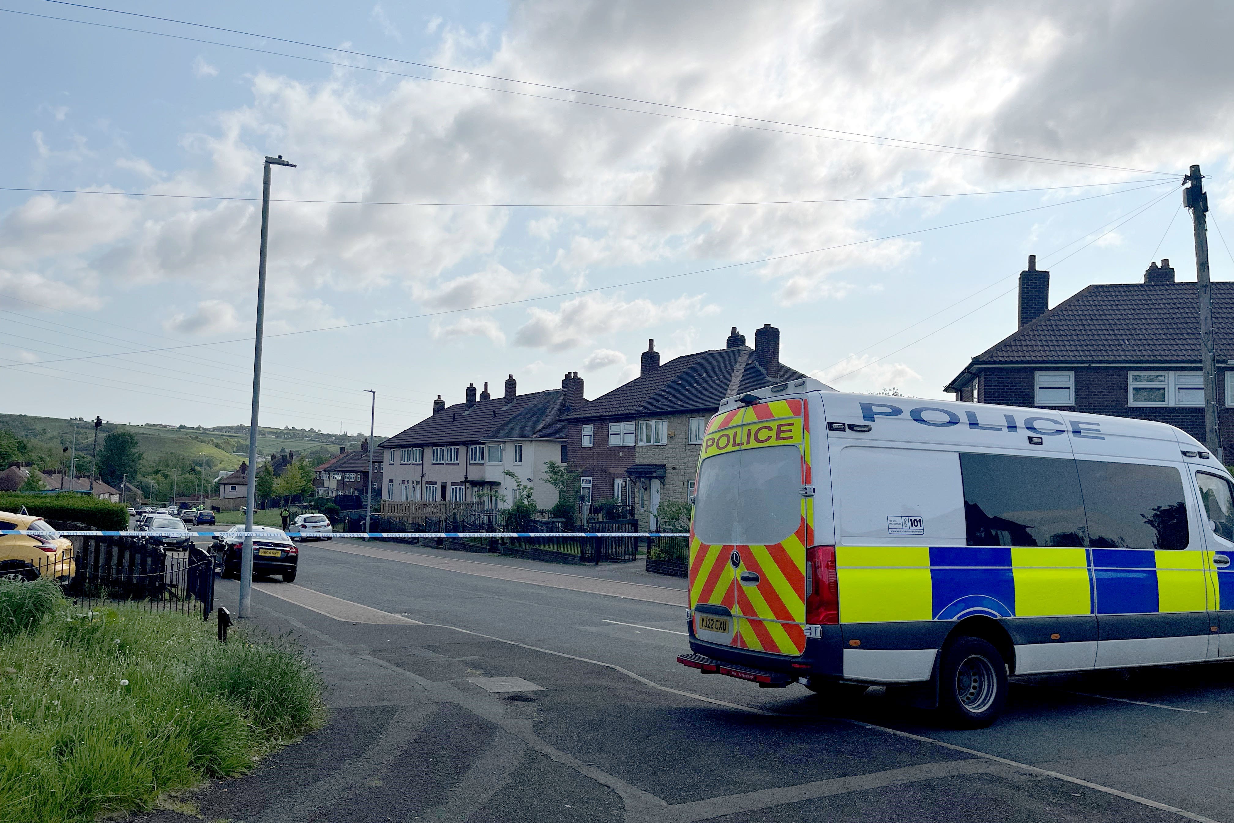 A police cordon on Harpe Inge, Huddersfield (Katie Dickinson/PA)