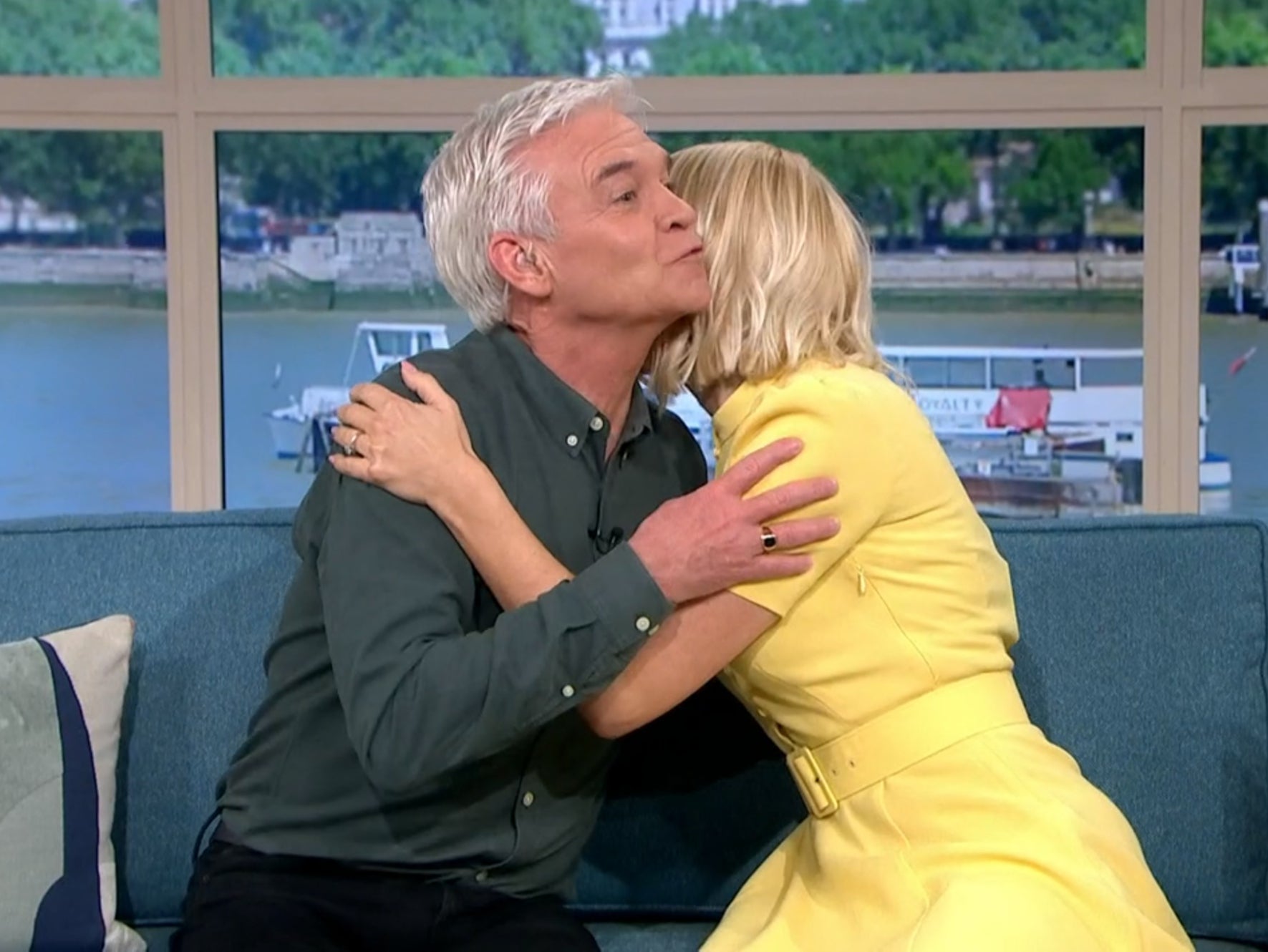 Phillip Schofield and Holly Willoughby share awkward goodbye kiss on This Morning