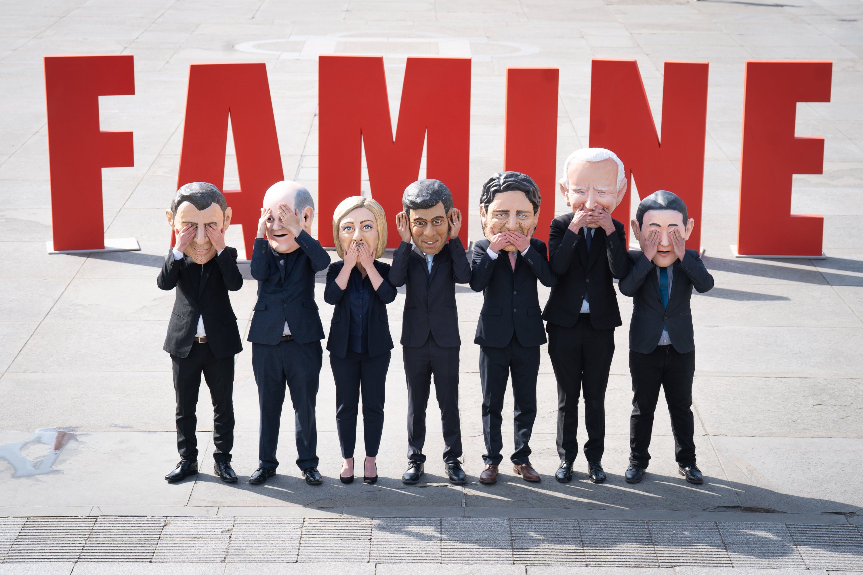 Oxfam activists wearing 'big heads' of G7 leaders during a demonstration in Trafalgar Square, London, highlighting their lack of action to tackle the East Africa hunger crisis ahead of the start of the G7 summit in Japan