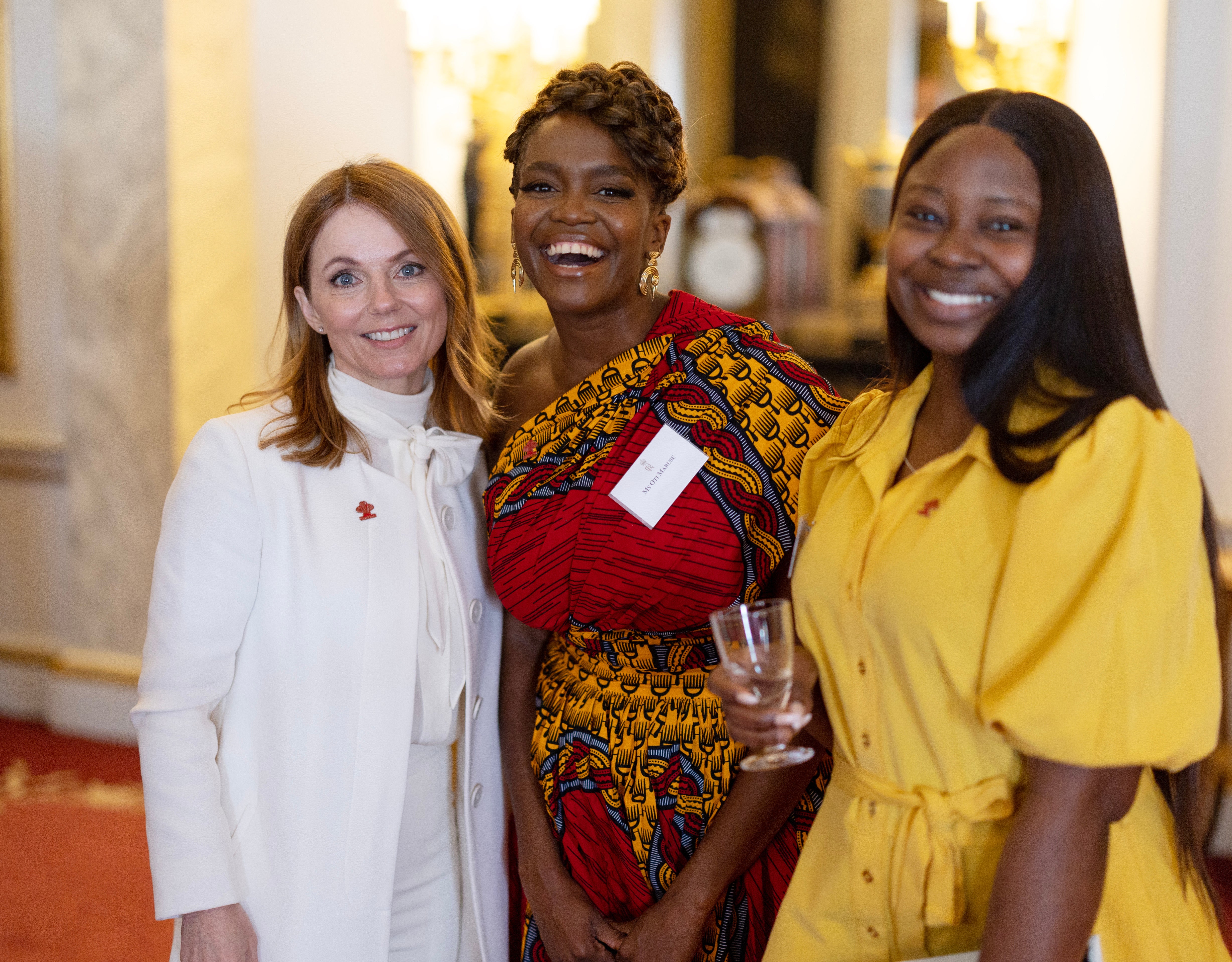 Geri Horner, Oti Mabuse and Funmilola Sosanya pose as King Charles III hosts the winners of the Prince's Trust awards and celebrity ambassadors at Buckingham Palace on May 17, 2023