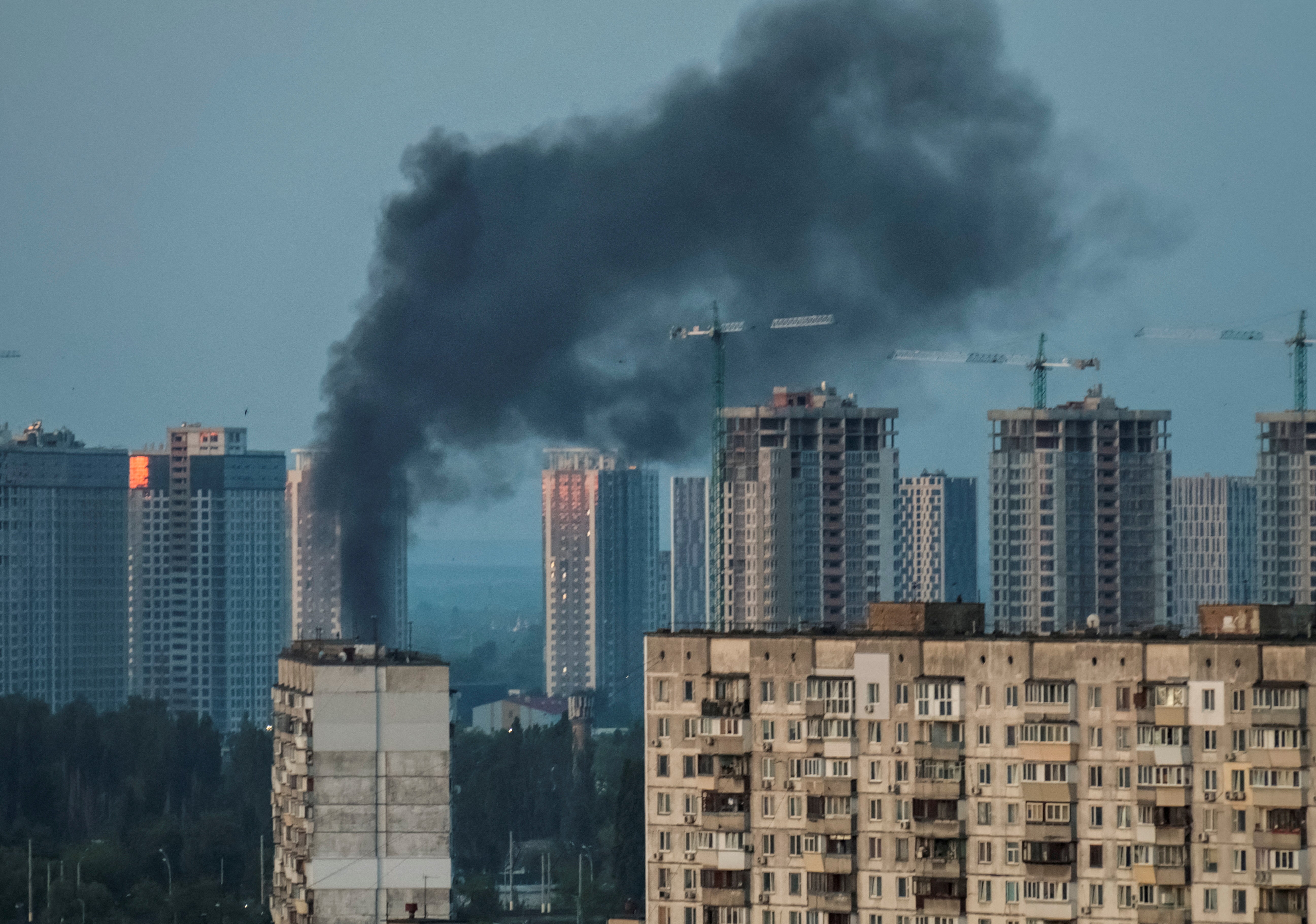 Smoke rises after a Russian missile strike in Kyiv