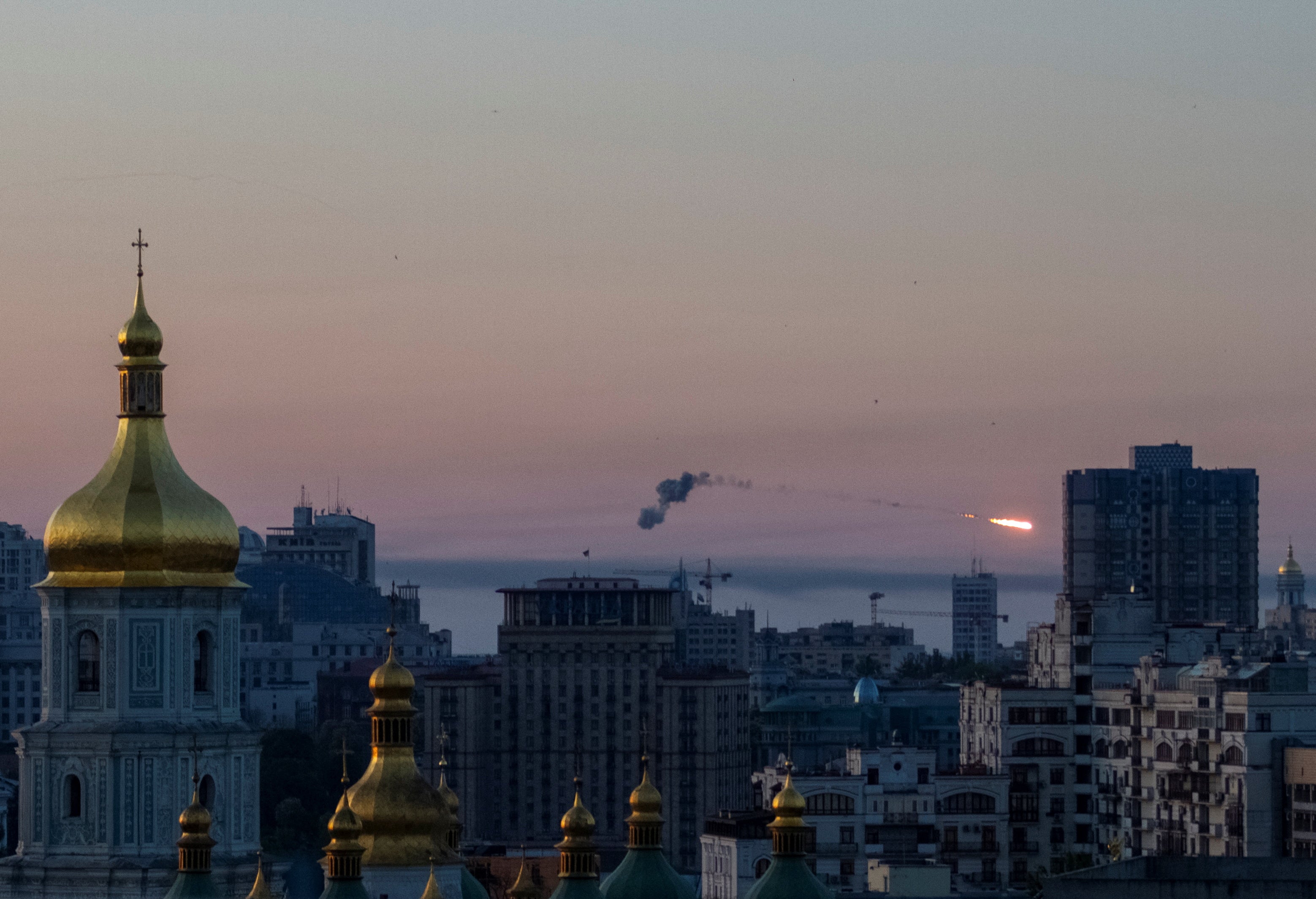 A missile explodes over Kyiv on Thursday