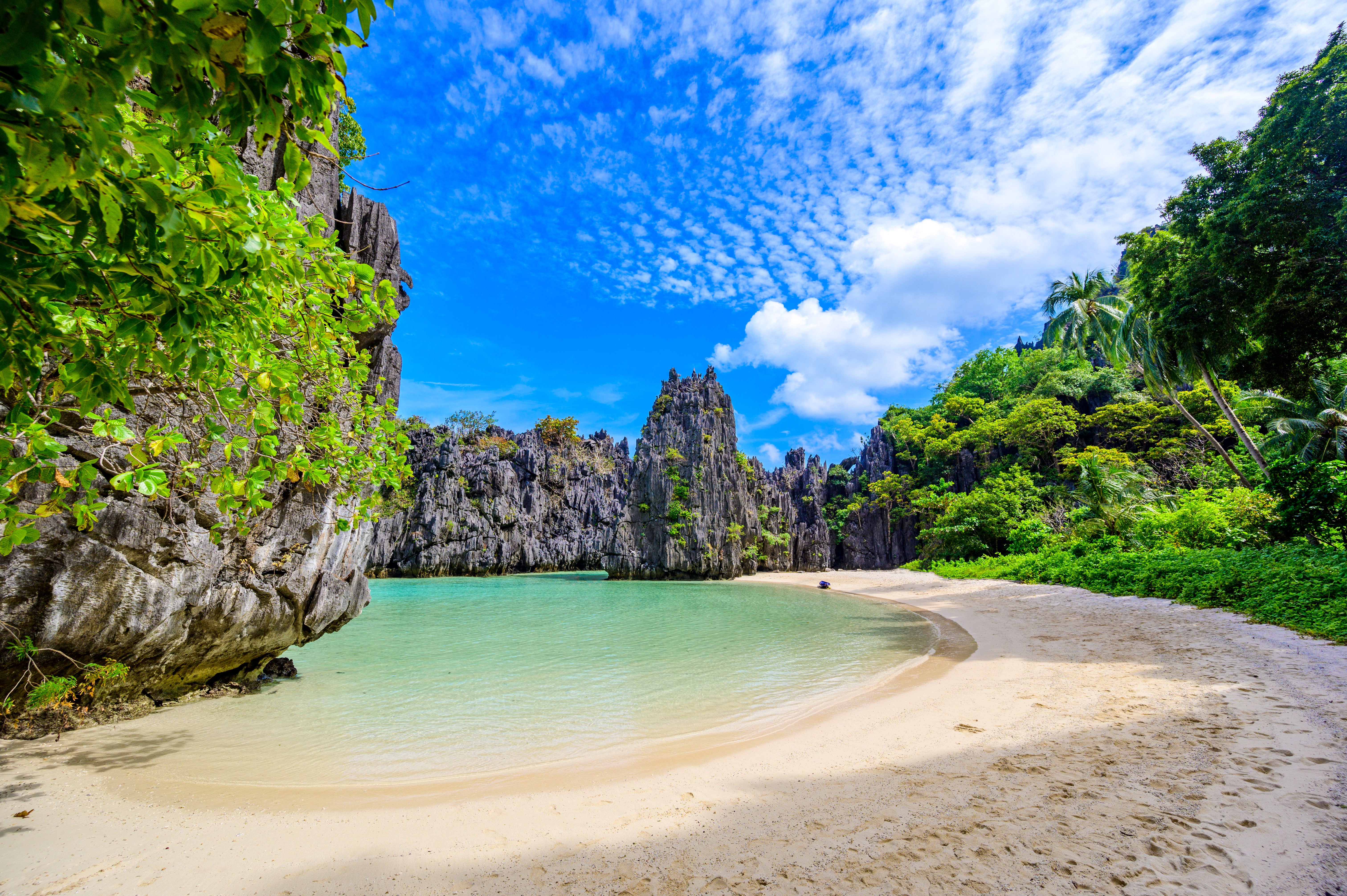 The tropical Hidden Beach, Matinloc Island