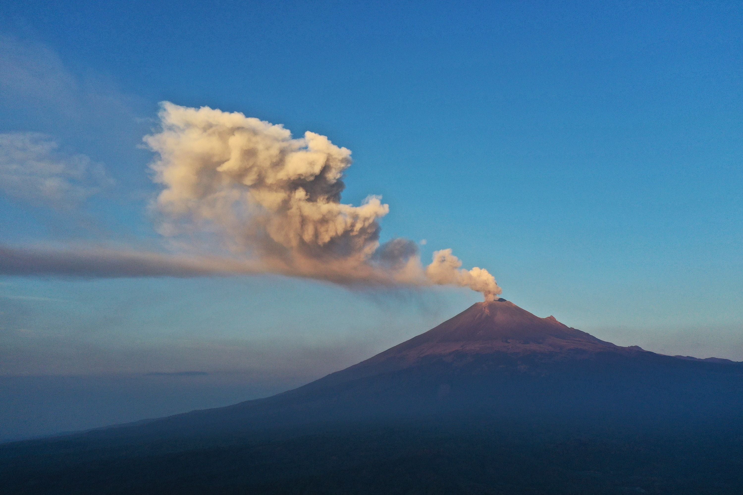 The Popocatepetl Volcano spews ash and smoke as seen from Puebal, state of Puebla, Mexico, on May 18, 2023