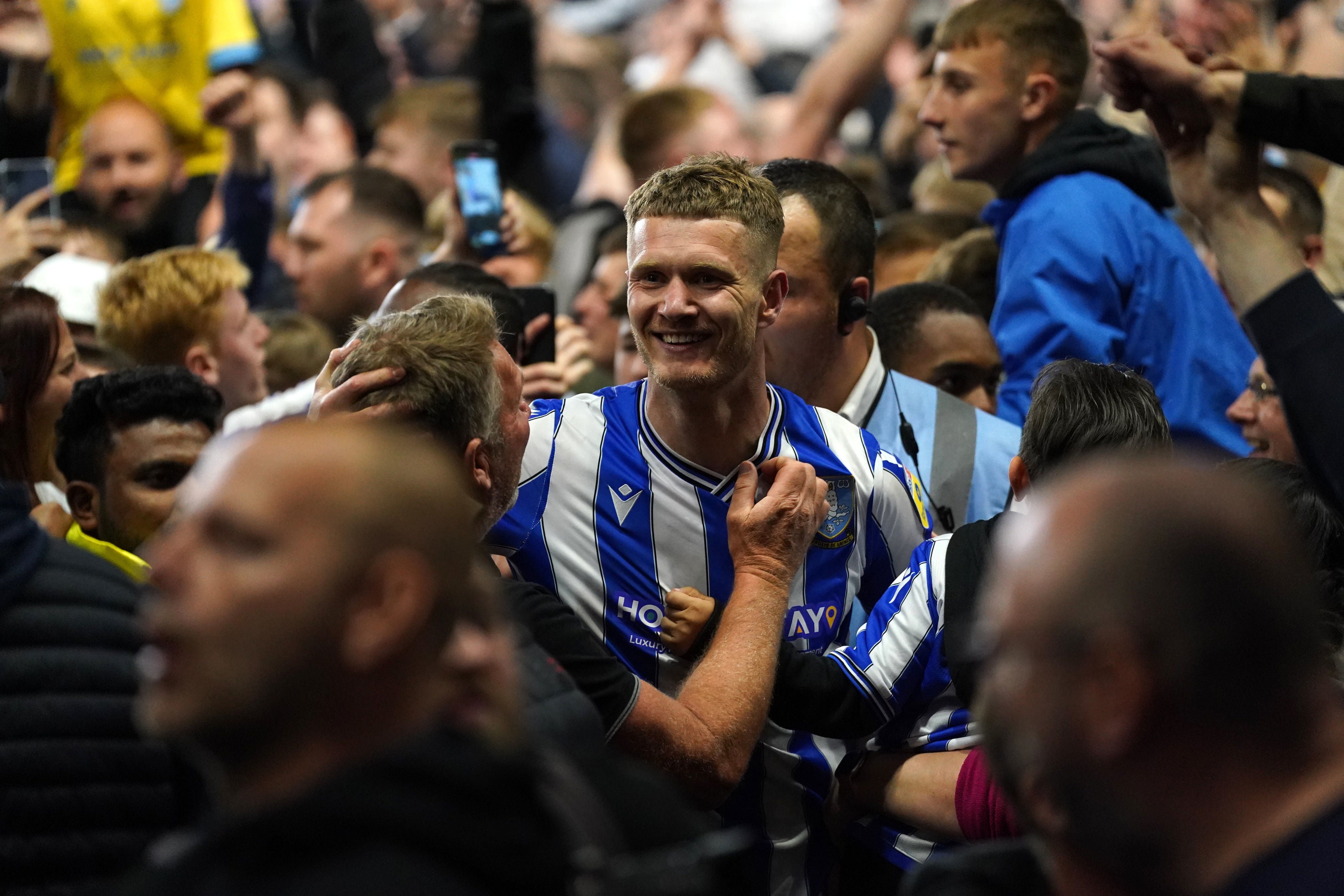 A pitch invasion greeted the remarkable comeback at full-time