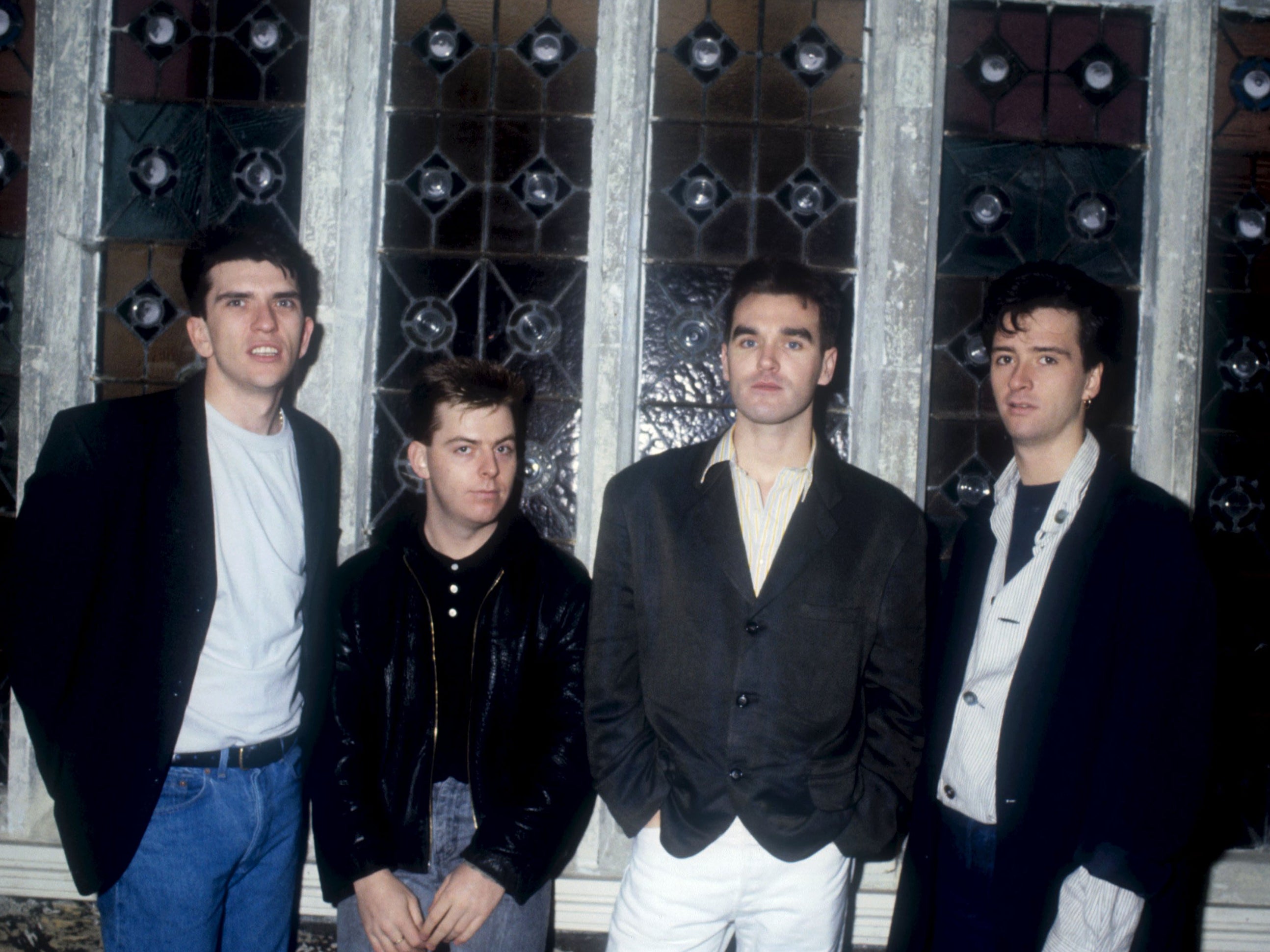 Andy Rourke [second from left] pictured with his Smiths bandmates in 1987