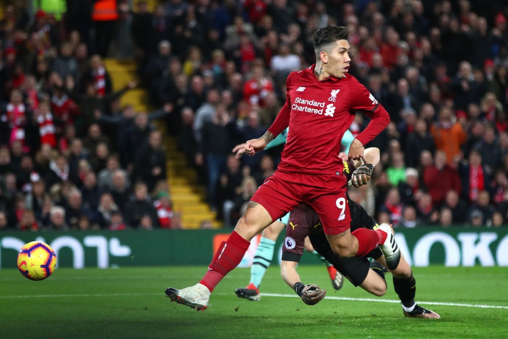 Firmino scores with a trademark ‘no-look’ finish against Arsenal in December 2018 - his favourite Liverpool game