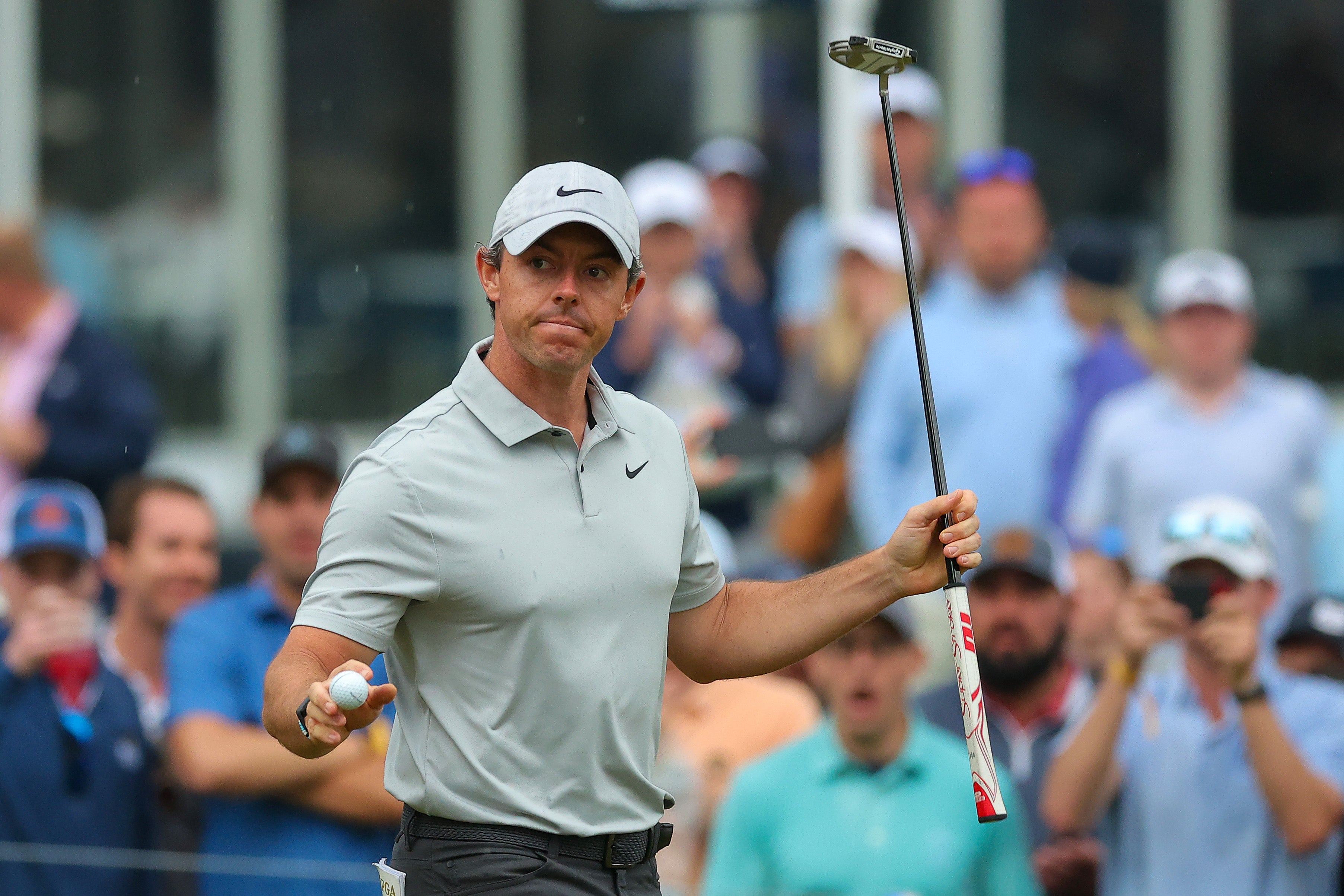 Rory McIlroy posted a one-under 69 to start the weekend five shots behind the leaders