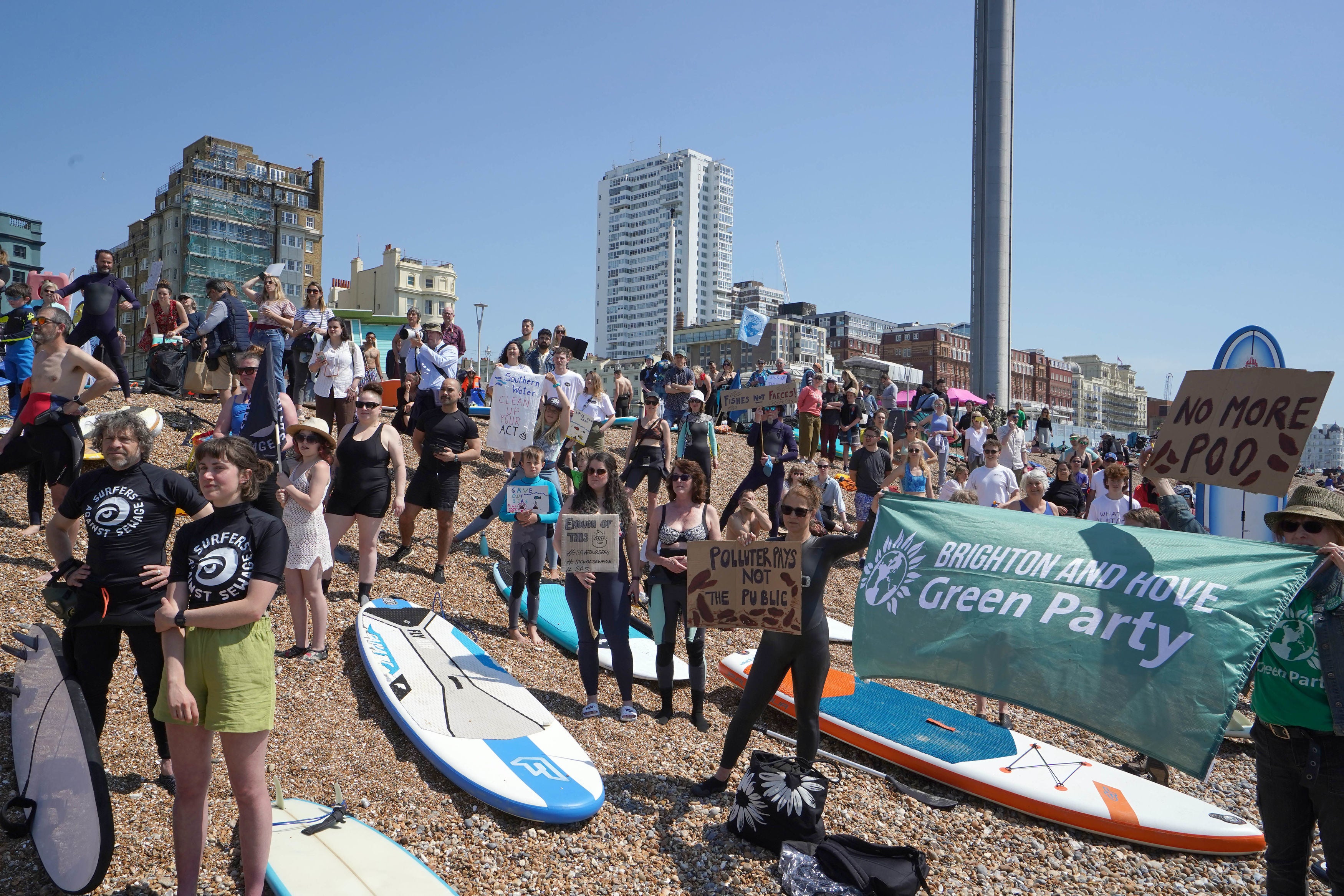 Surfers Against Sewage hold a UK-wide paddle-out protest at Brighton West Pier in East Sussex