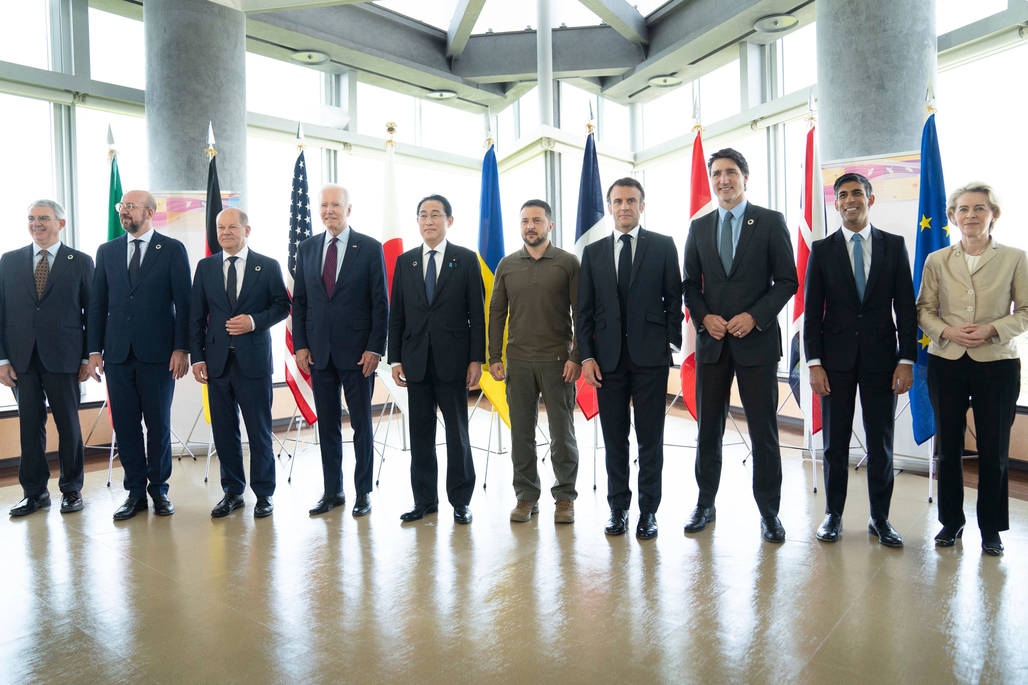 Ukrainian President Volodymyr Zelensky, center, poses with G7 world leaders on the final day of the G7 Summit in Hiroshima, Japan in May.From left to right are: Gianluigi Benedetti, Italian ambassador to Japan, European Council President Charles Michel, German Chancellor Olaf Scholz, U.S. President Joe Biden, Japan's Prime Minister Fumio Kishida, Zelenskyy, France's President Emmanuel Macron, Canada's Prime Minister Justin Trudeau, Britain's Prime Minister Rishi Sunak and European Commission President Ursula von der Leyen