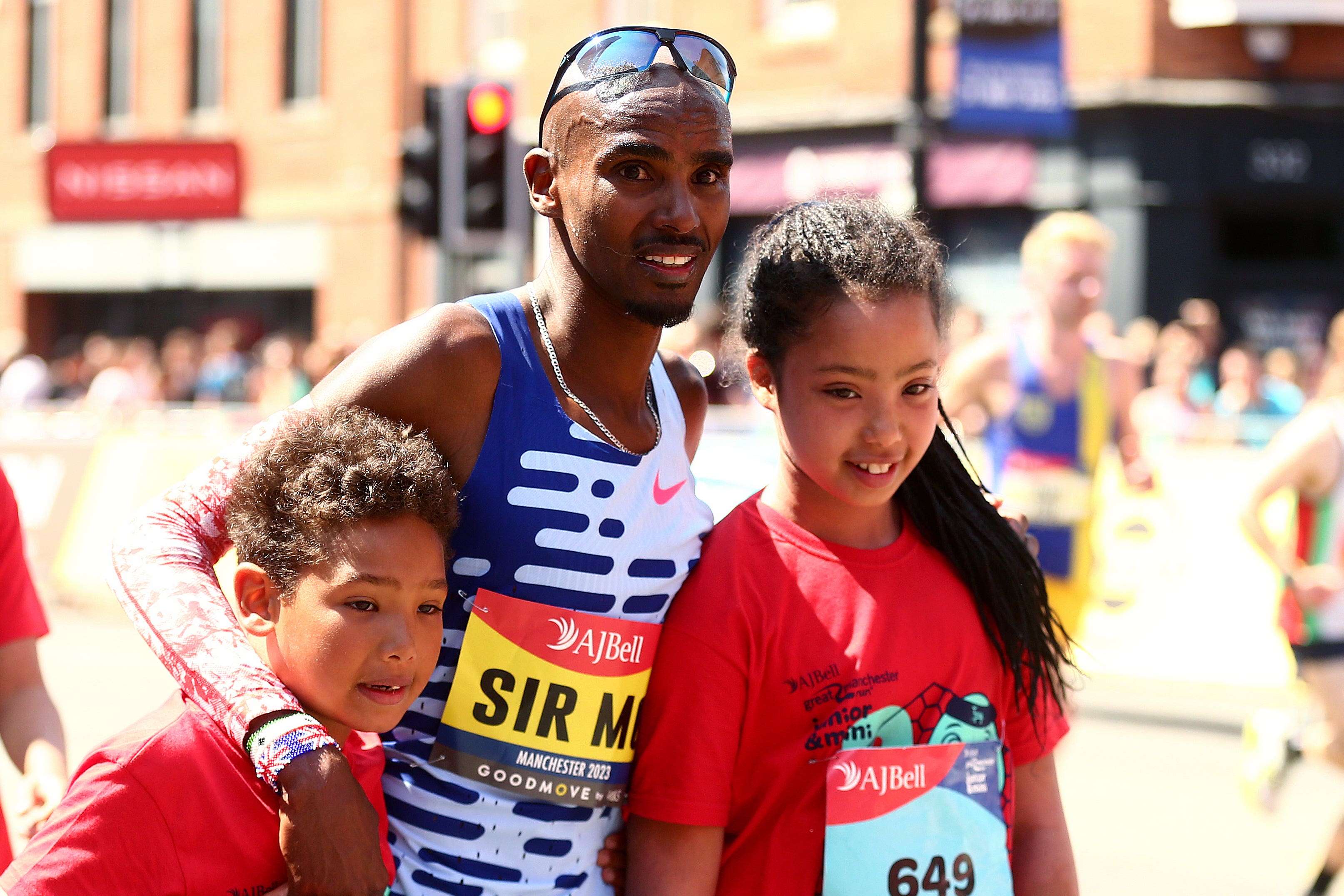 Sir Mo Farah with his children at the Great Manchester Run (Tim Markland/PA)