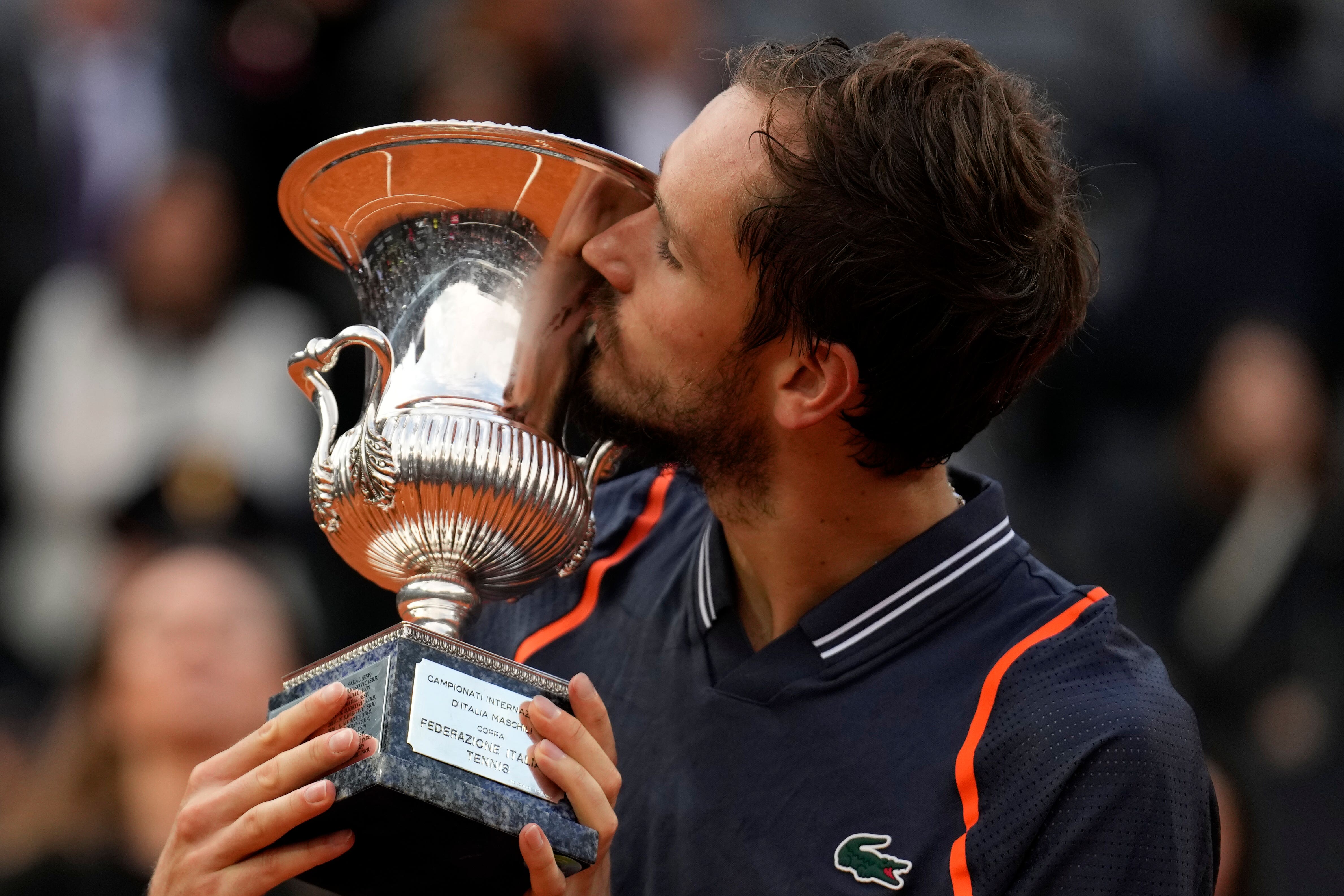 Daniil Medvedev kisses the Italian Open trophy (Alessandra Tarantino/AP)