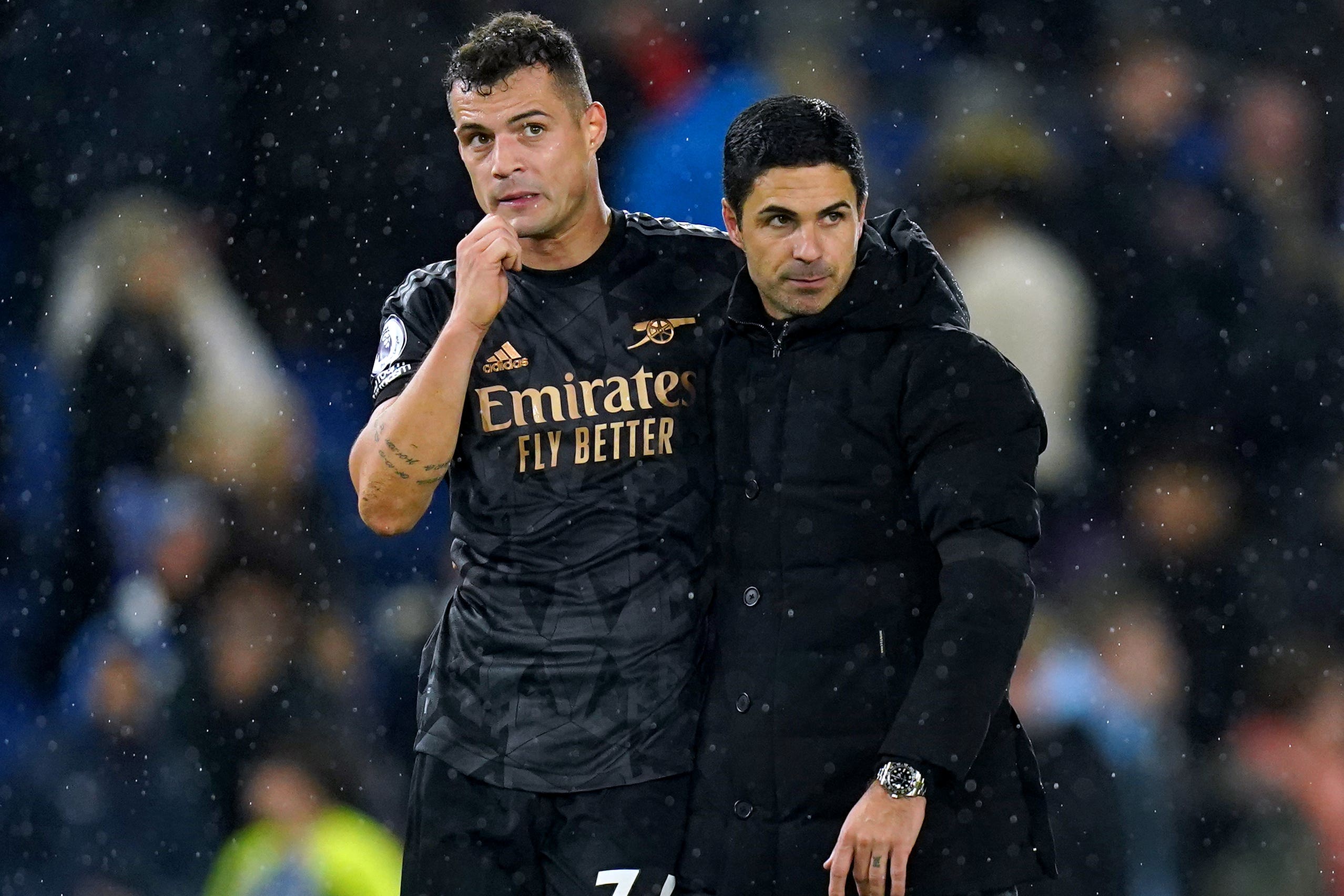 Granit Xhaka, left, has talked up Mikel Arteta, right (Adam davy/PA)