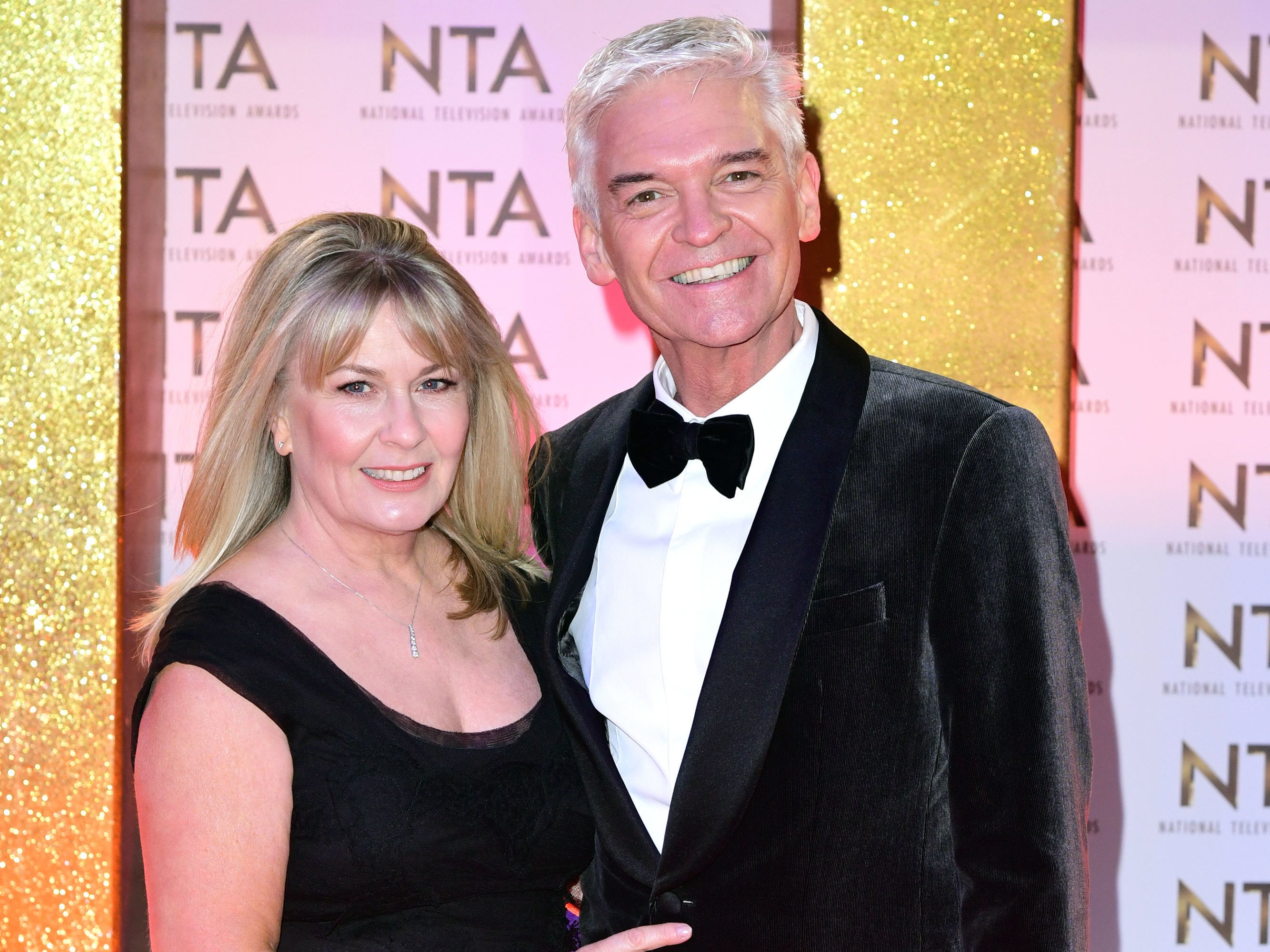 Phillip Schofield (right) and his wife Stephanie Lowe during the National Television Awards at London's O2 Arena