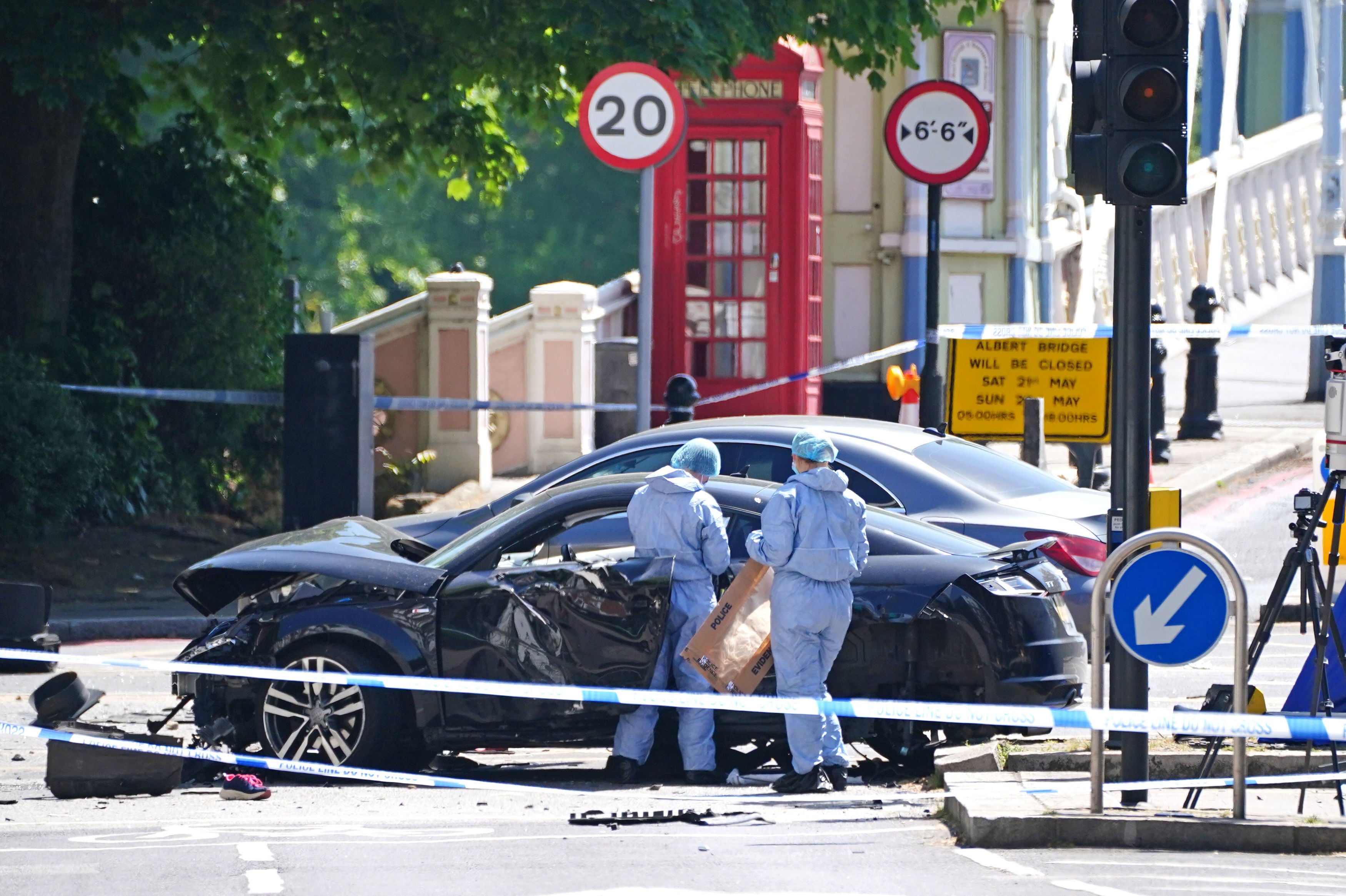 Police forensic officers at the scene at Cheyne Walk in Chelsea, London