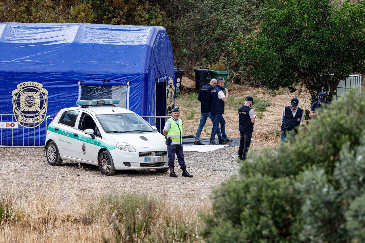 Portuguese authorities gathered at a makeshift camp near the reservoir