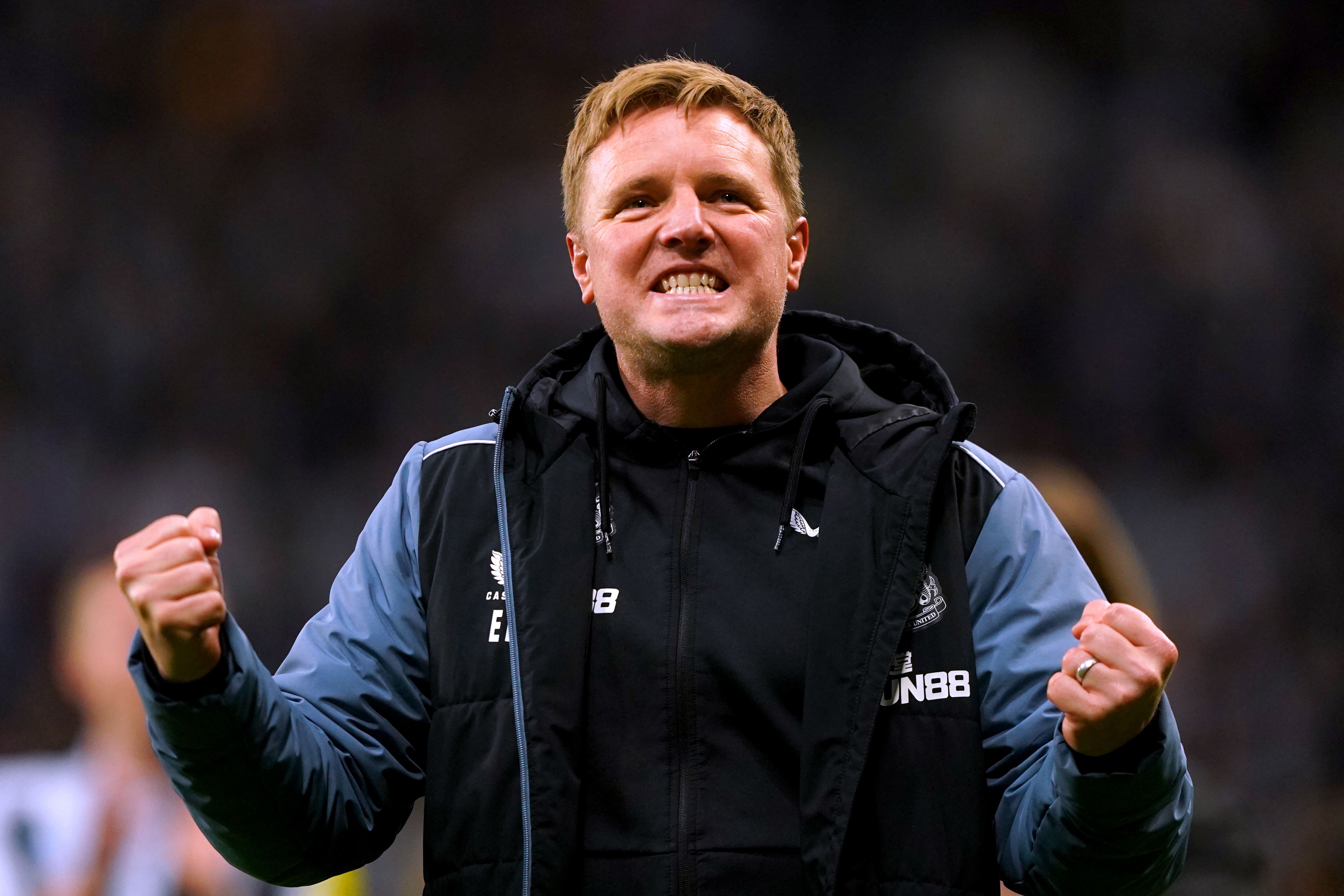 Eddie Howe celebrates after Newcastle clinch Champions League qualification (Owen Humphreys/PA).