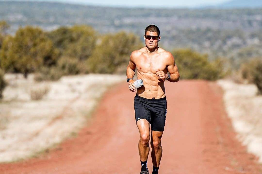 William Goodge running through Arizona during his journey across the US (Reece Robinson/PA)