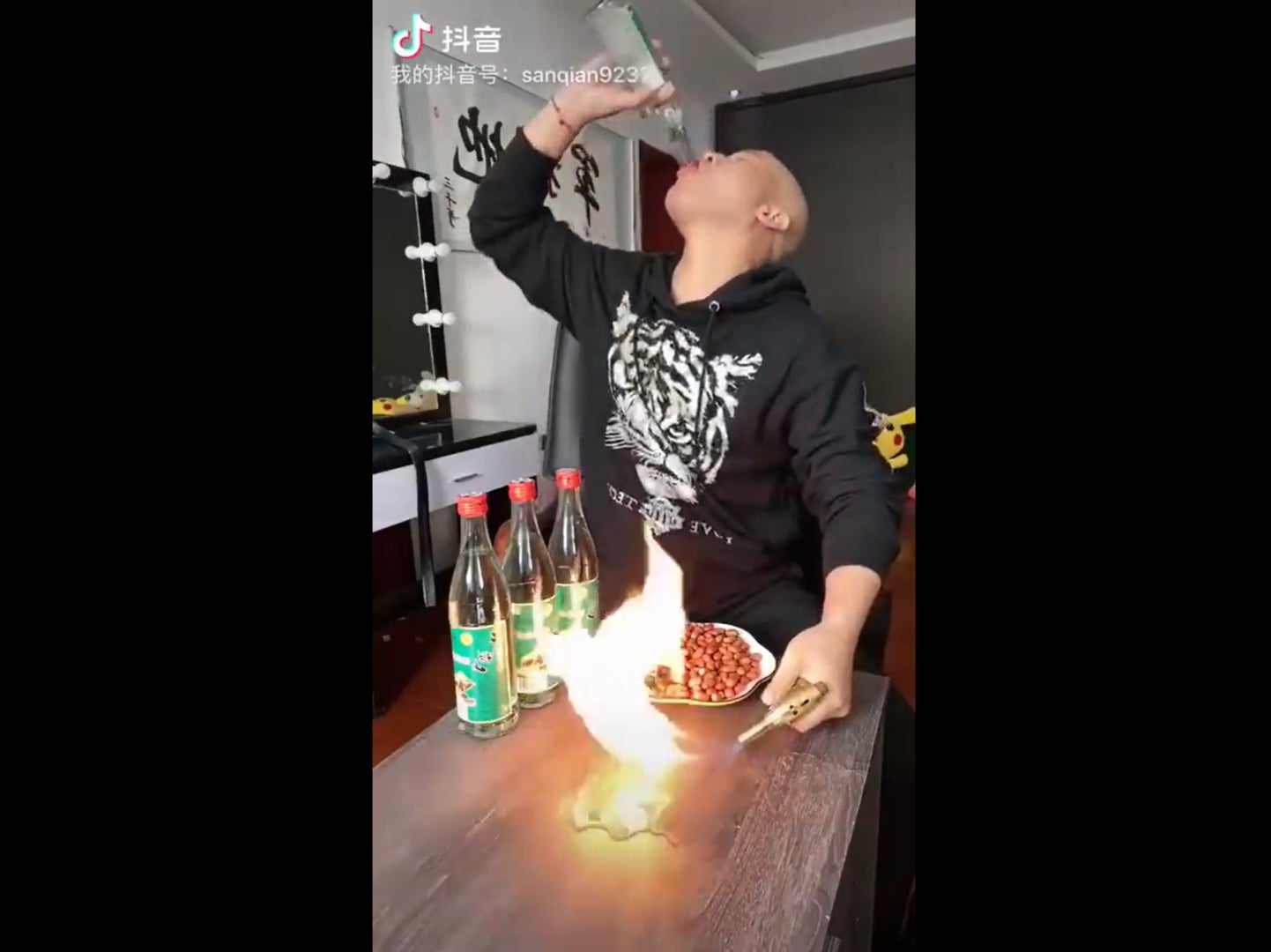 Chinese Douyin user drinking alcohol during livestream