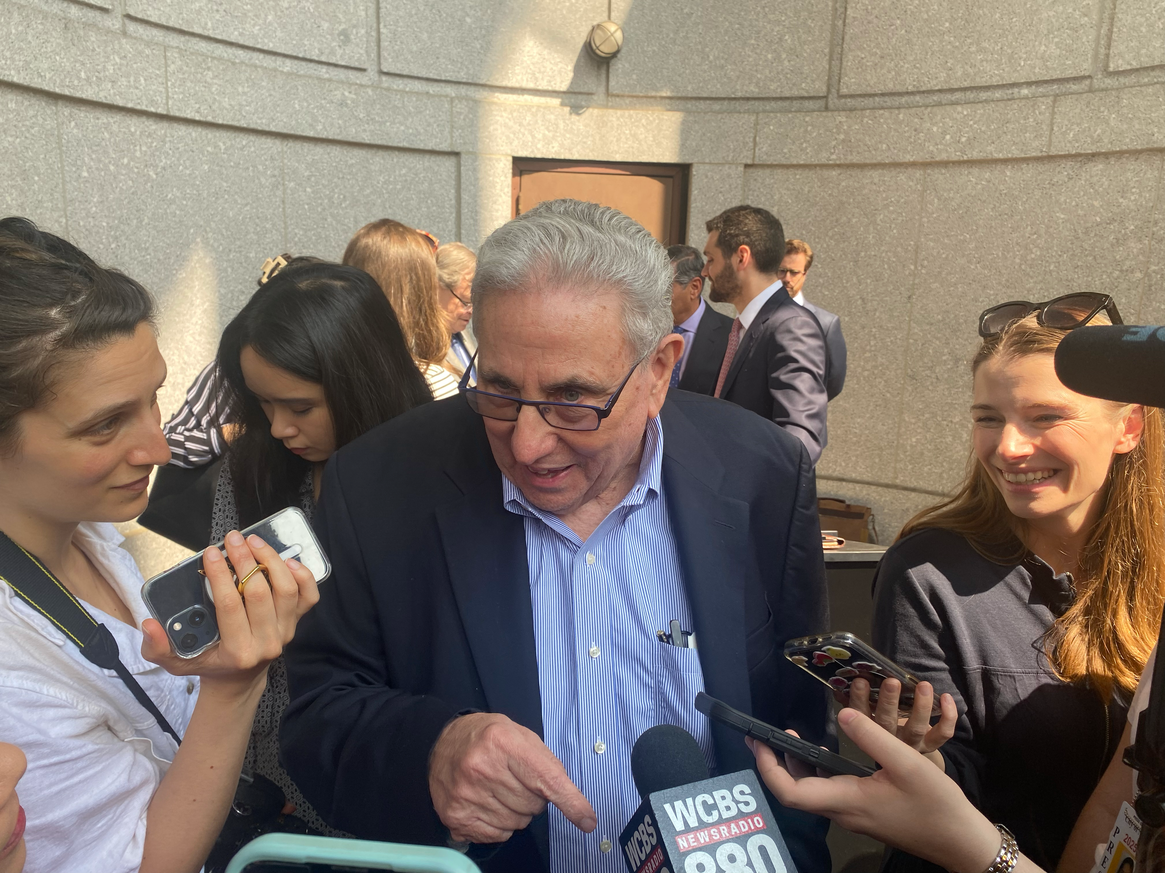 New York real estate titan Jeffrey Gural talks to reporters after successfully bidding $161m for the Flatiron Building at auction in New York on Tuesday